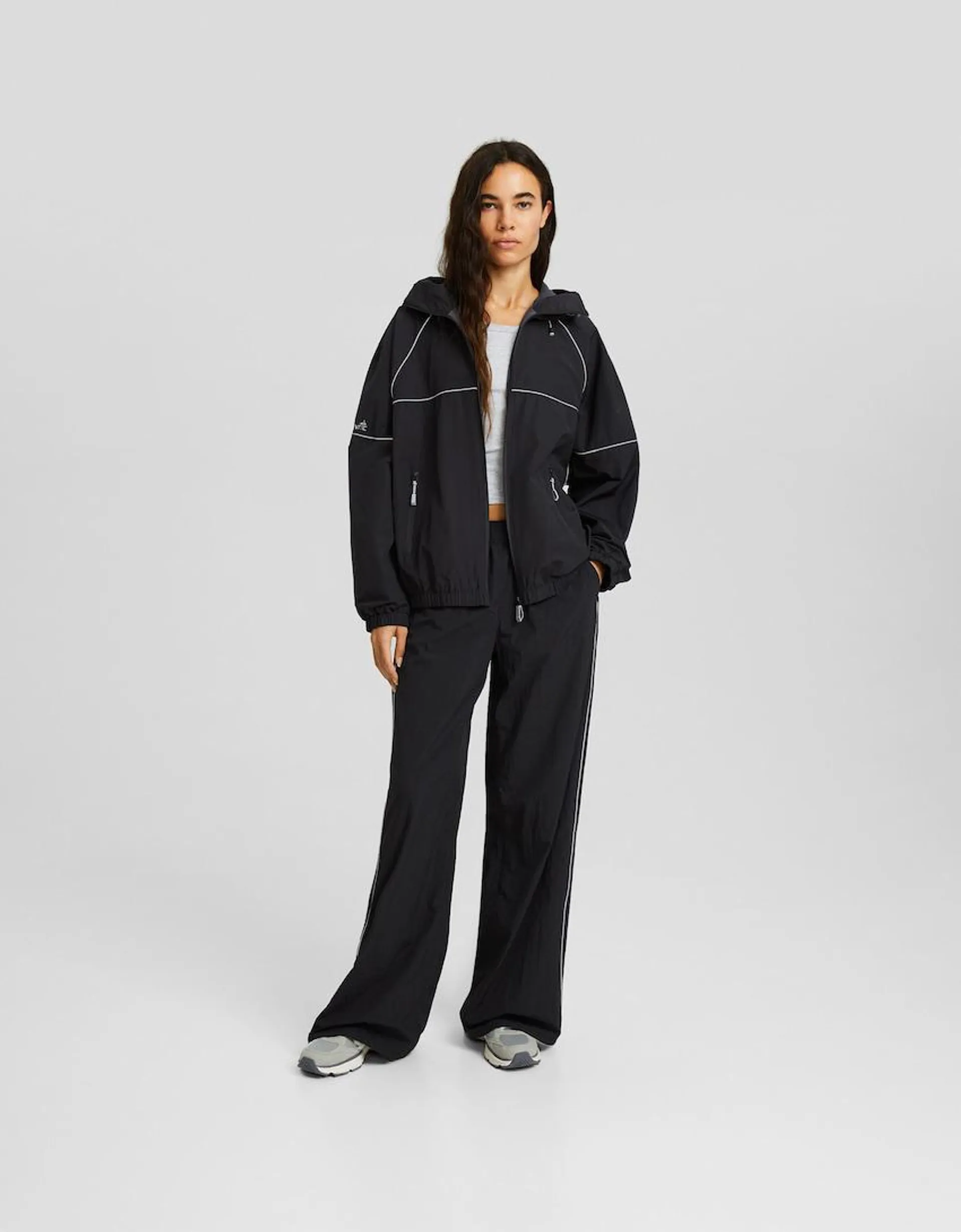 Wide-leg nylon trousers with detail