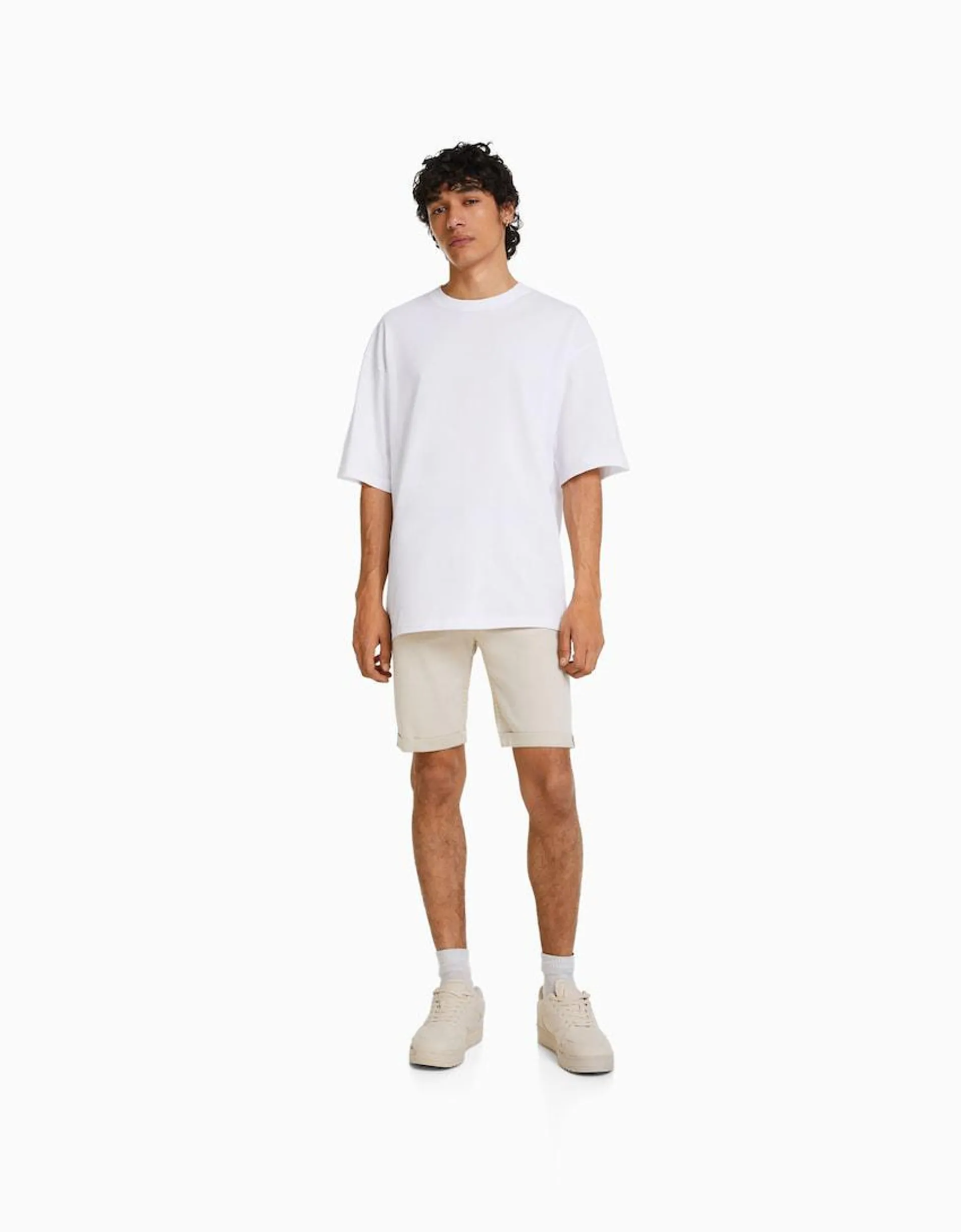 Skinny roll up denim Bermuda shorts