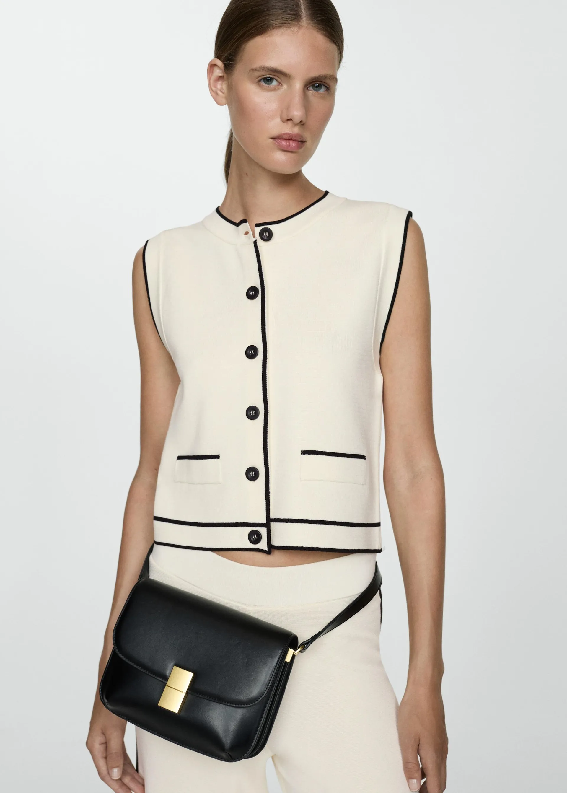 Knitted waistcoat with contrast piping