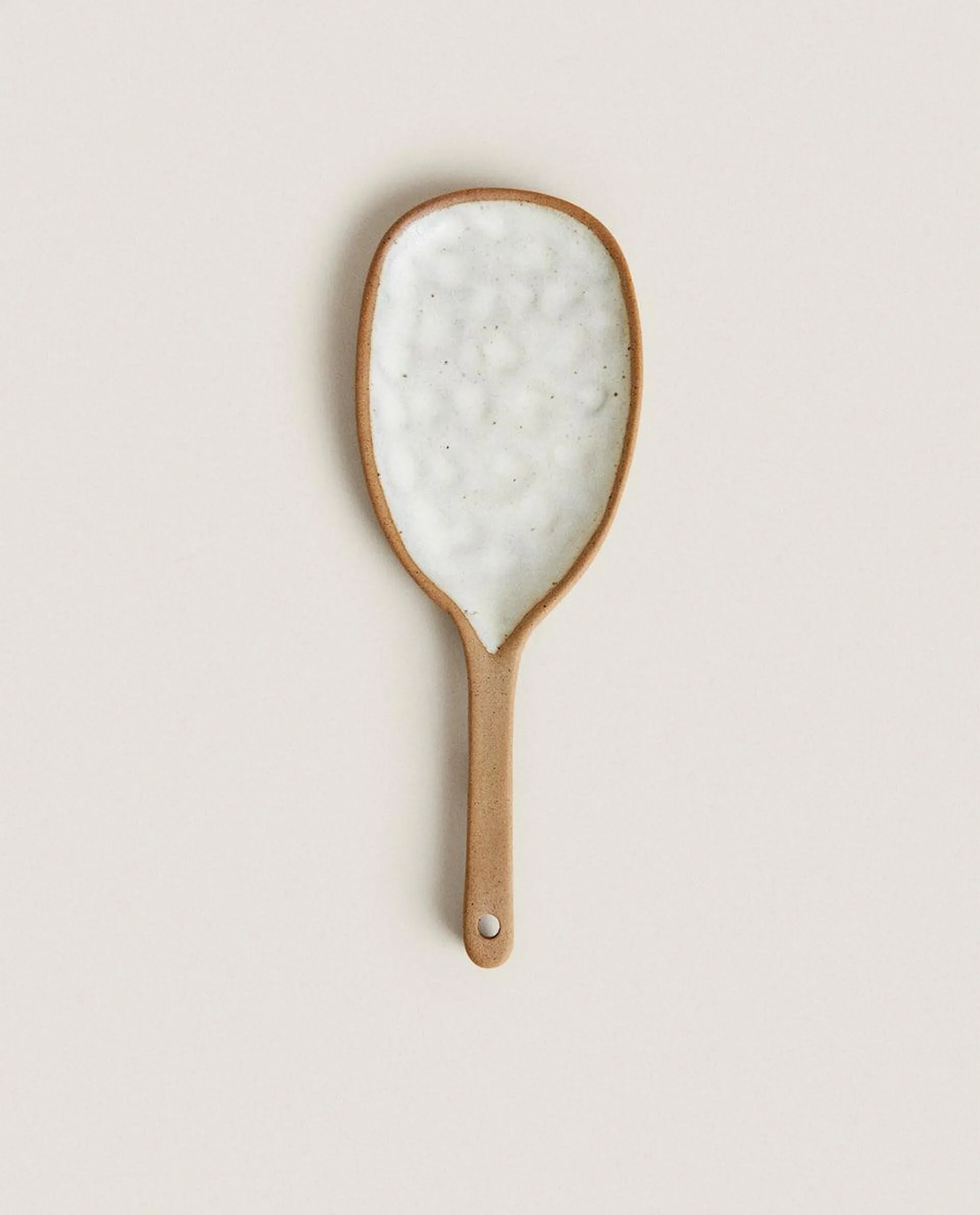 SPOON WITH RAISED DESIGN