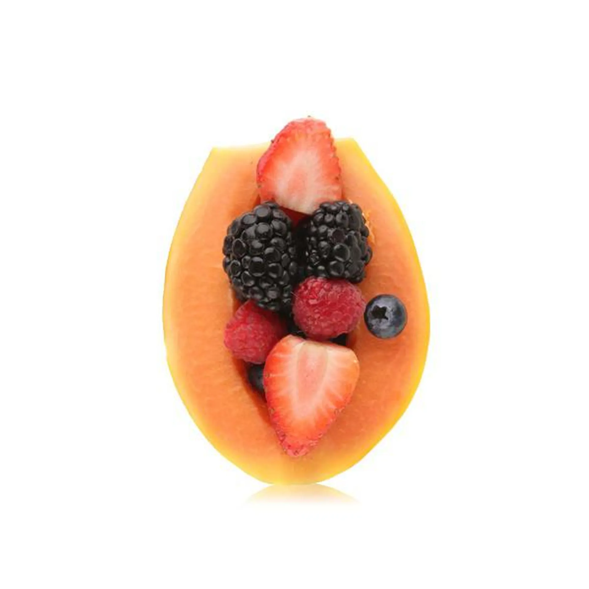 Papaya halves with berries