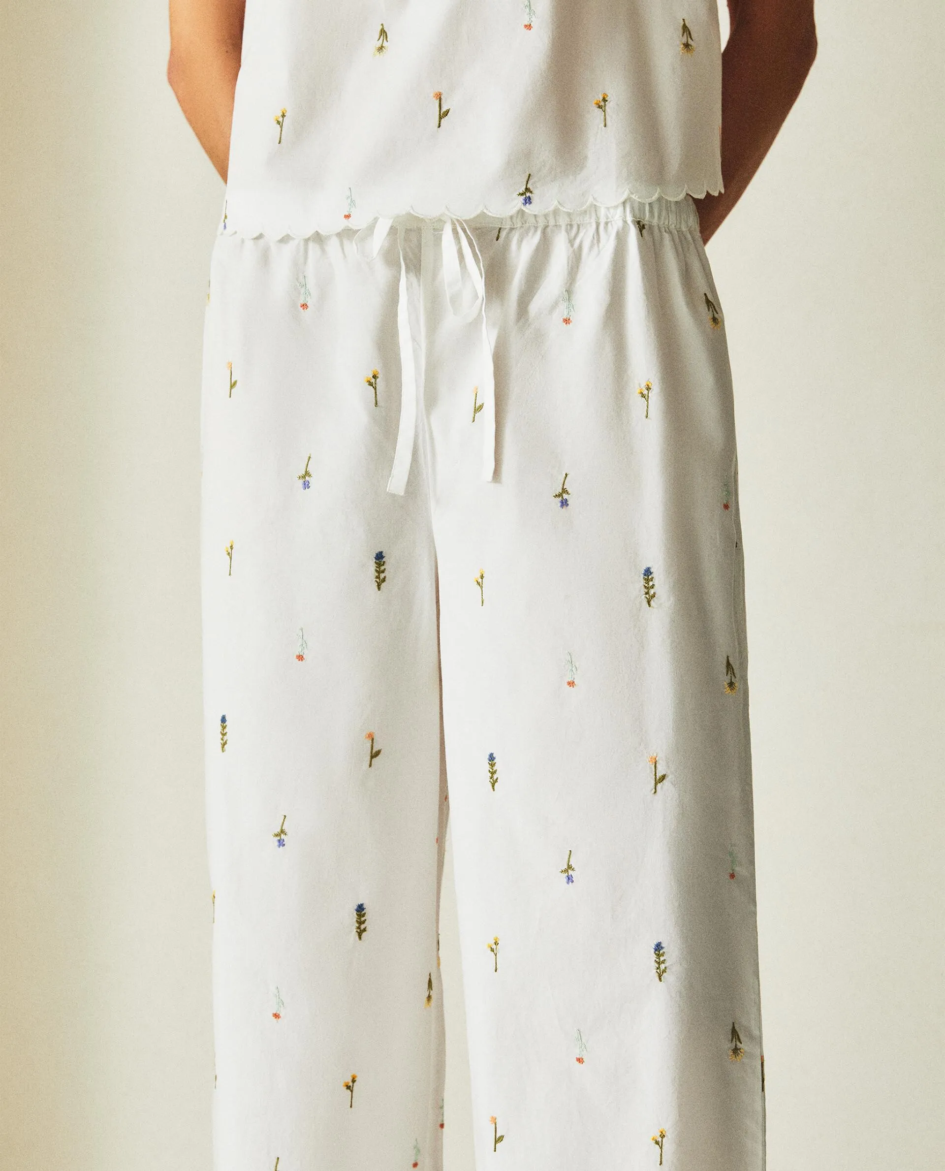 EMBROIDERED FLORAL TROUSERS