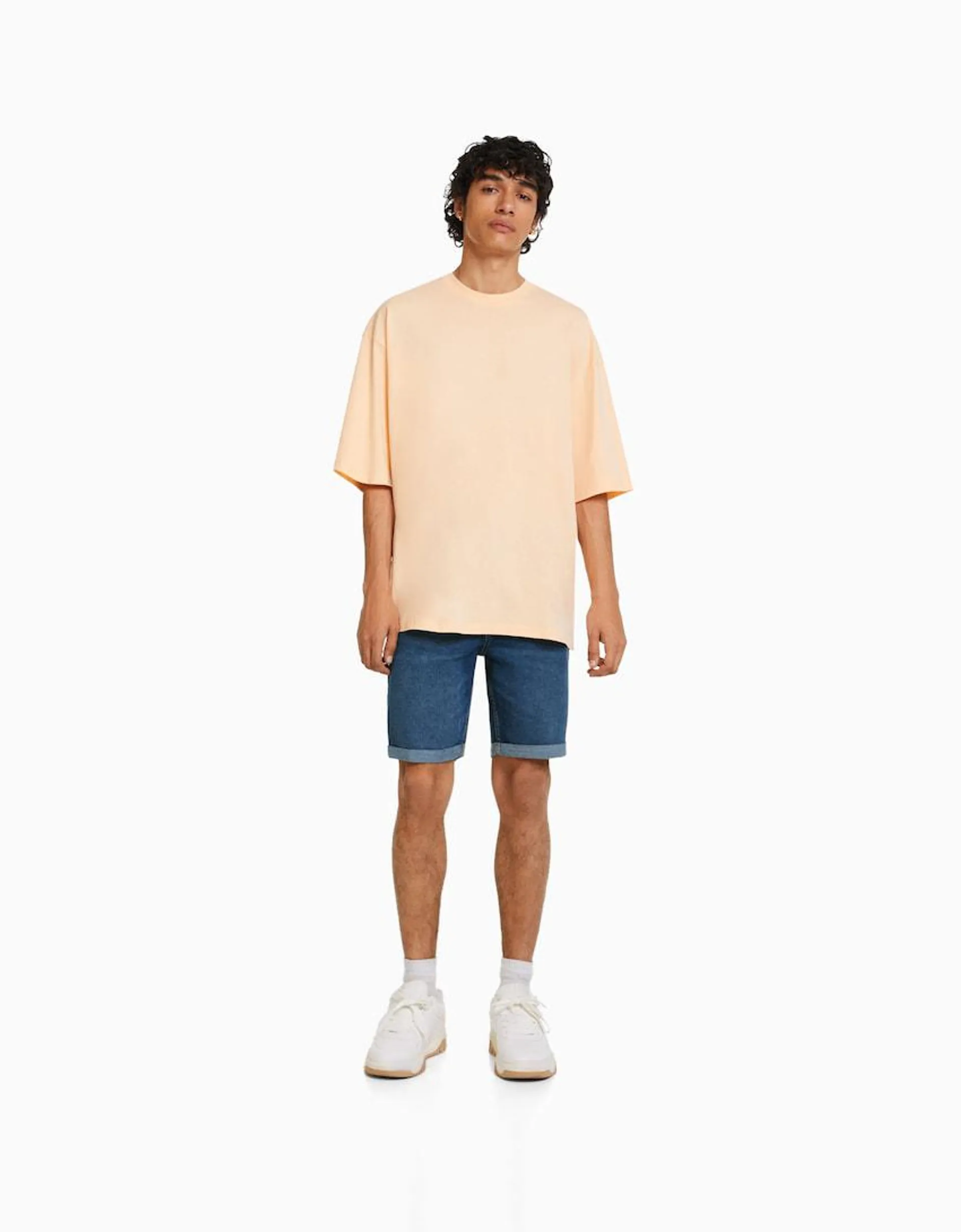 Skinny roll up denim Bermuda shorts