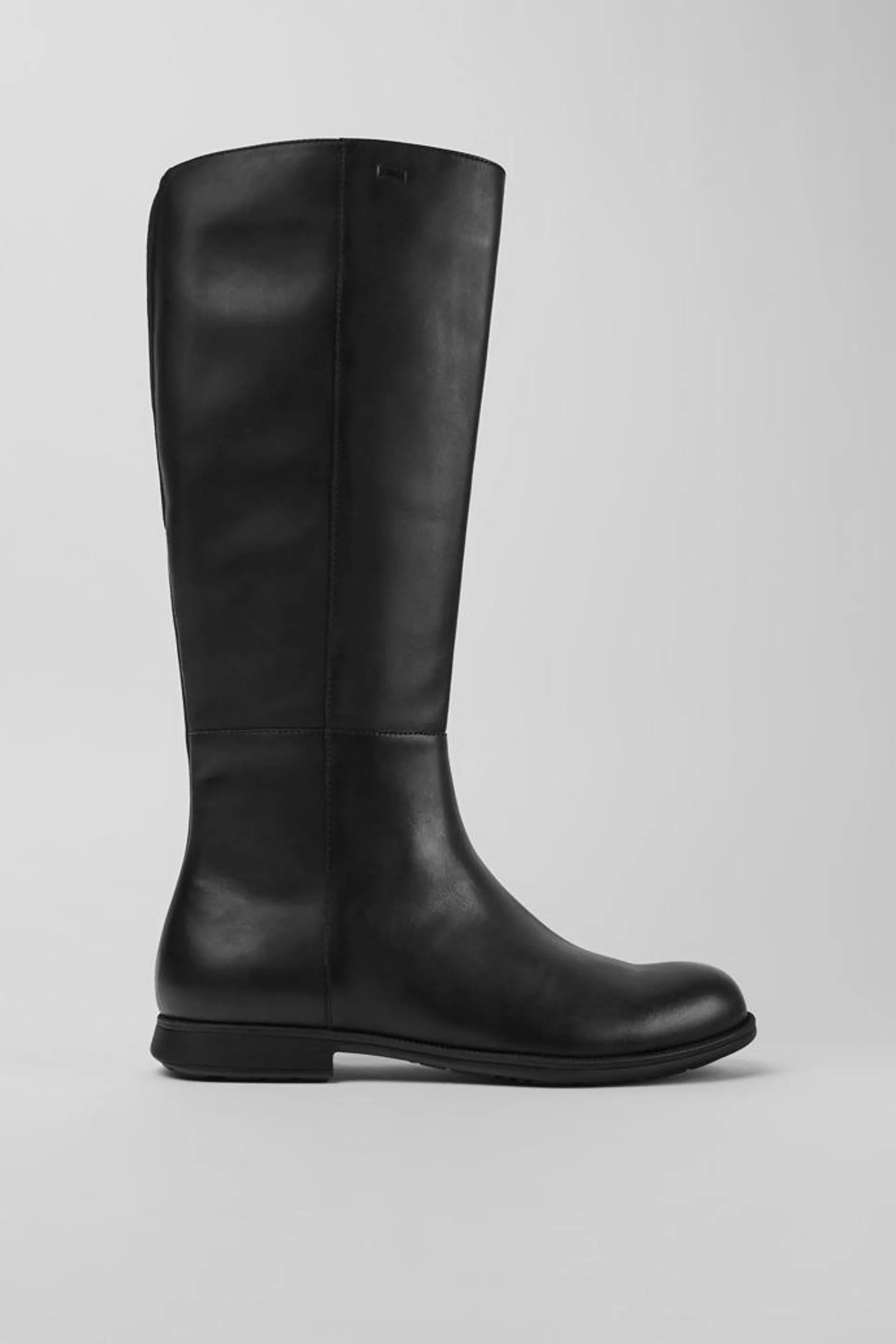 Botas negras de piel y tejido para mujer