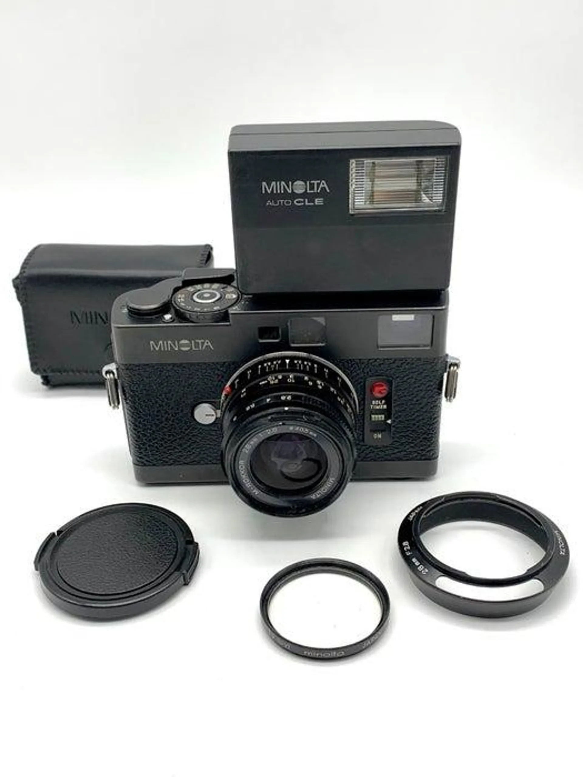 Used Minolta CLE w. 28mm f2.8 and Minolta CLE Flash S/N - 1014880 / 1010307