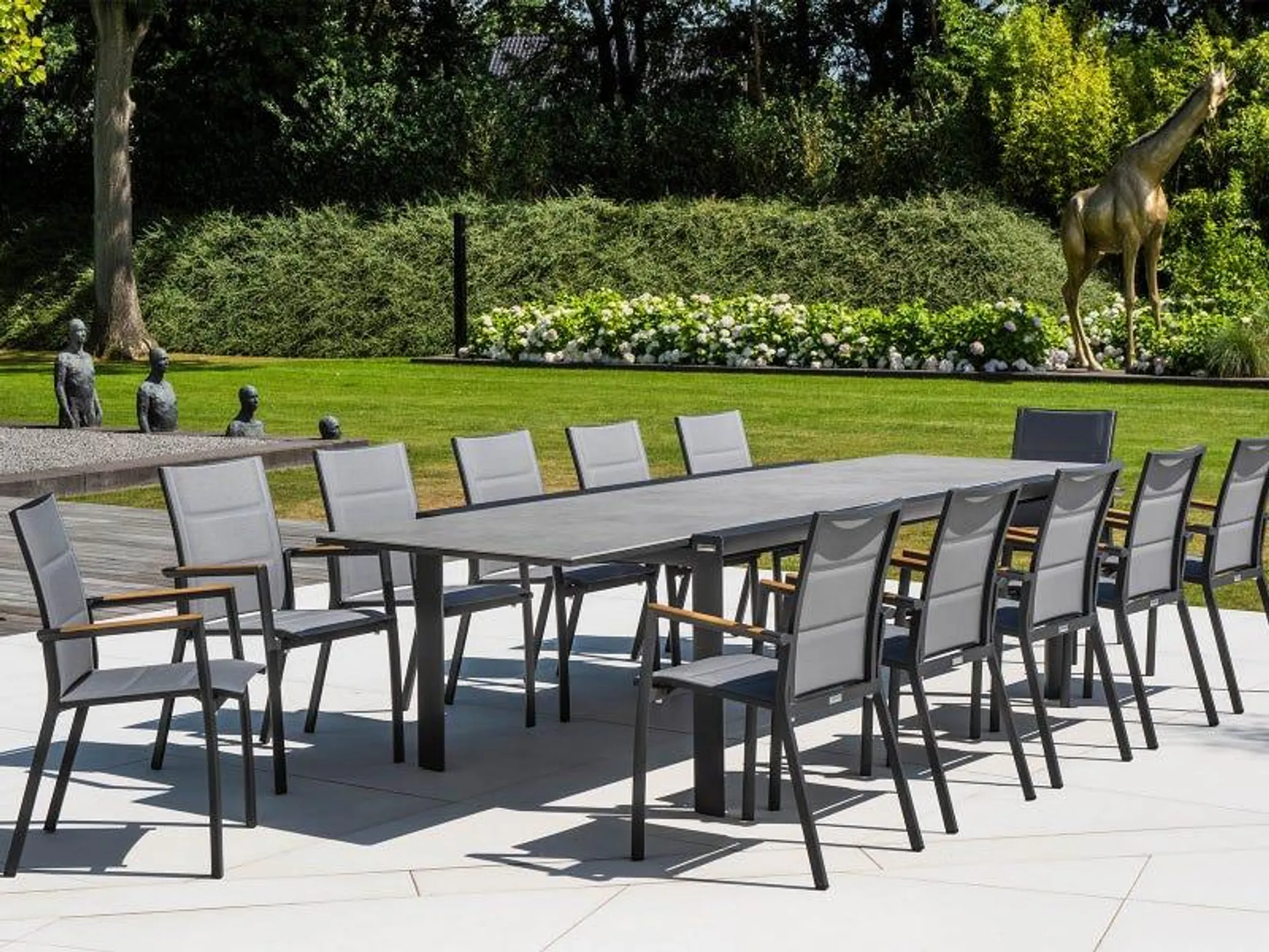 Mona Ceramic Extension Table with Sevilla Teak Arm Chairs -13pc Outdoor Dining Setting