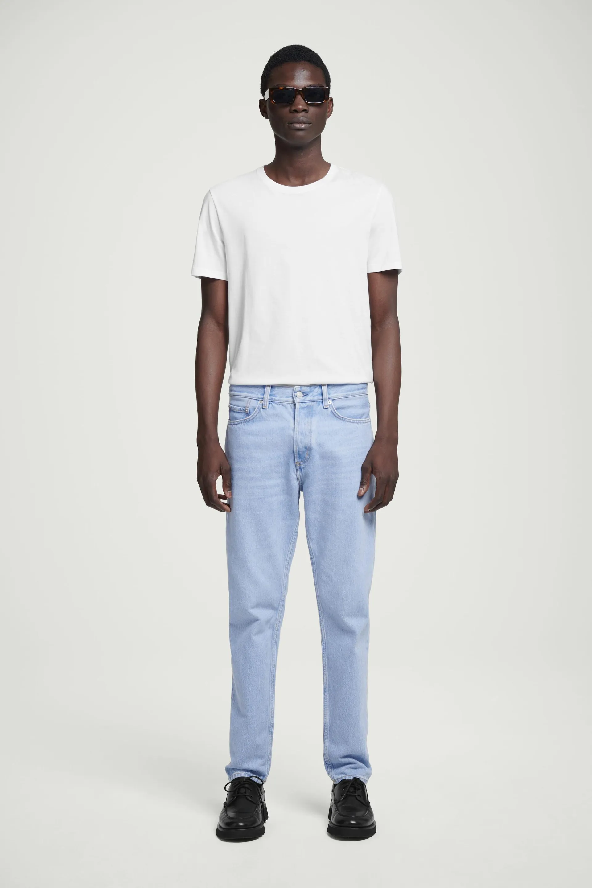 REGULAR-FIT TAPERED-LEG JEANS