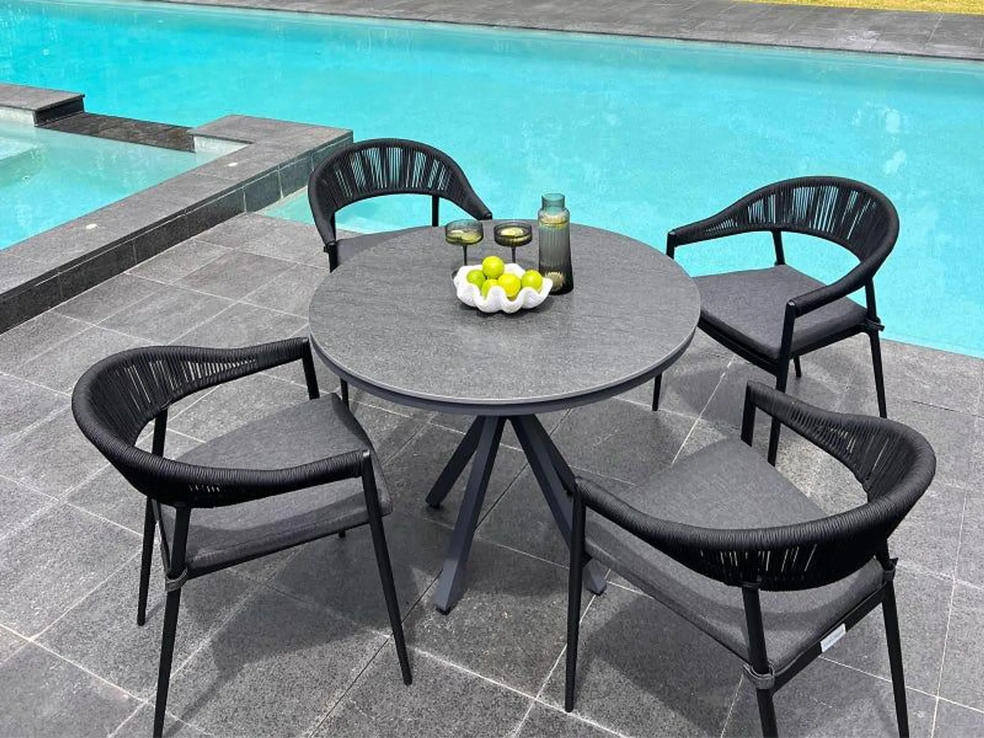 Adele Round Ceramic Table with Nivala Chairs 5pc Outdoor Dining Setting