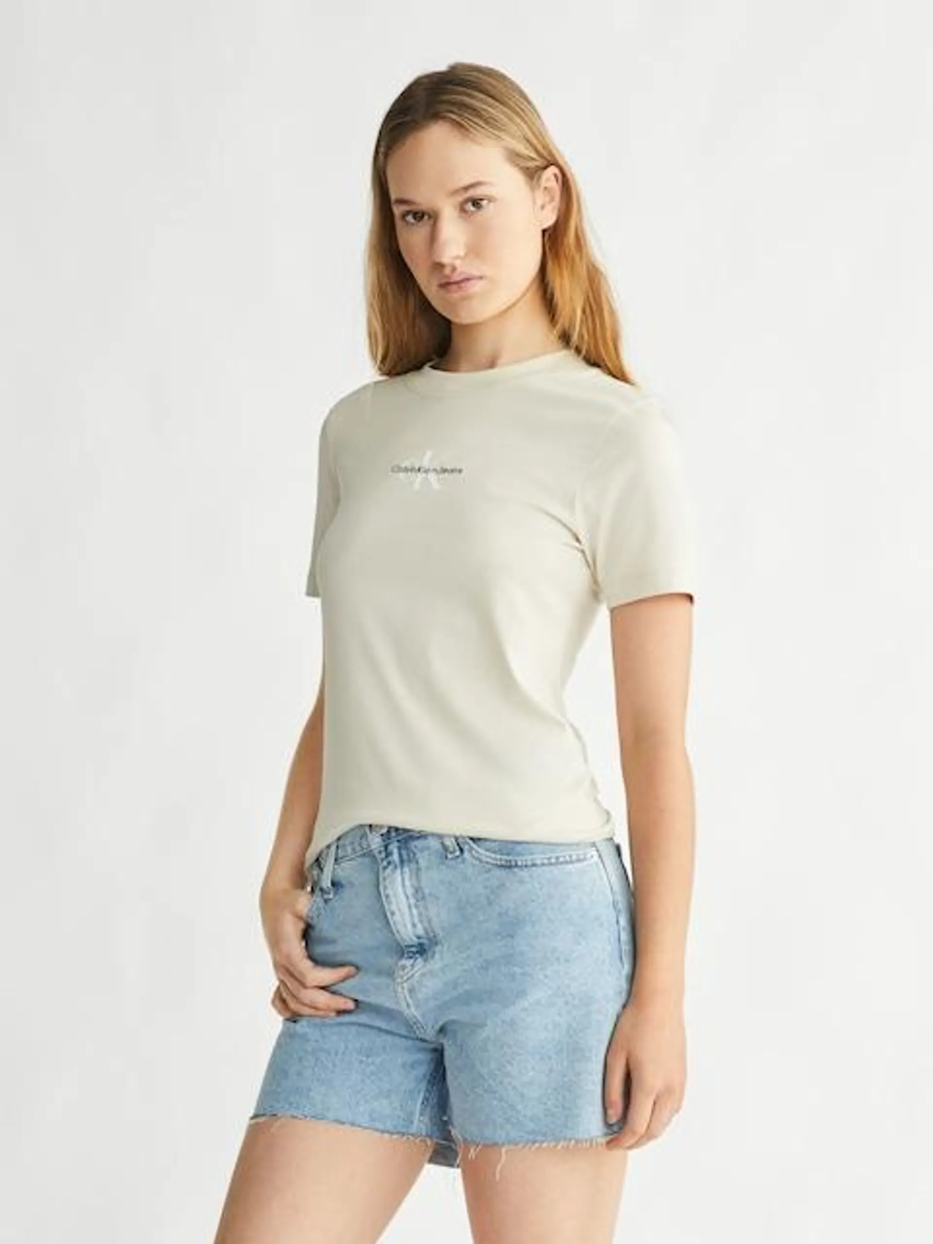 Calvin Klein Varsity Logo Baby Tee In Eggshell