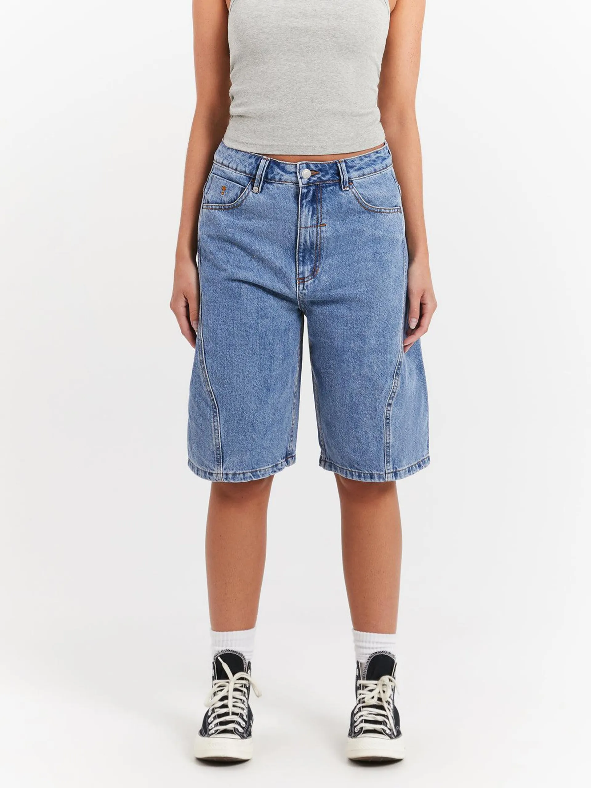 Ronnie Pieced Denim Shorts in Rinsed Blue