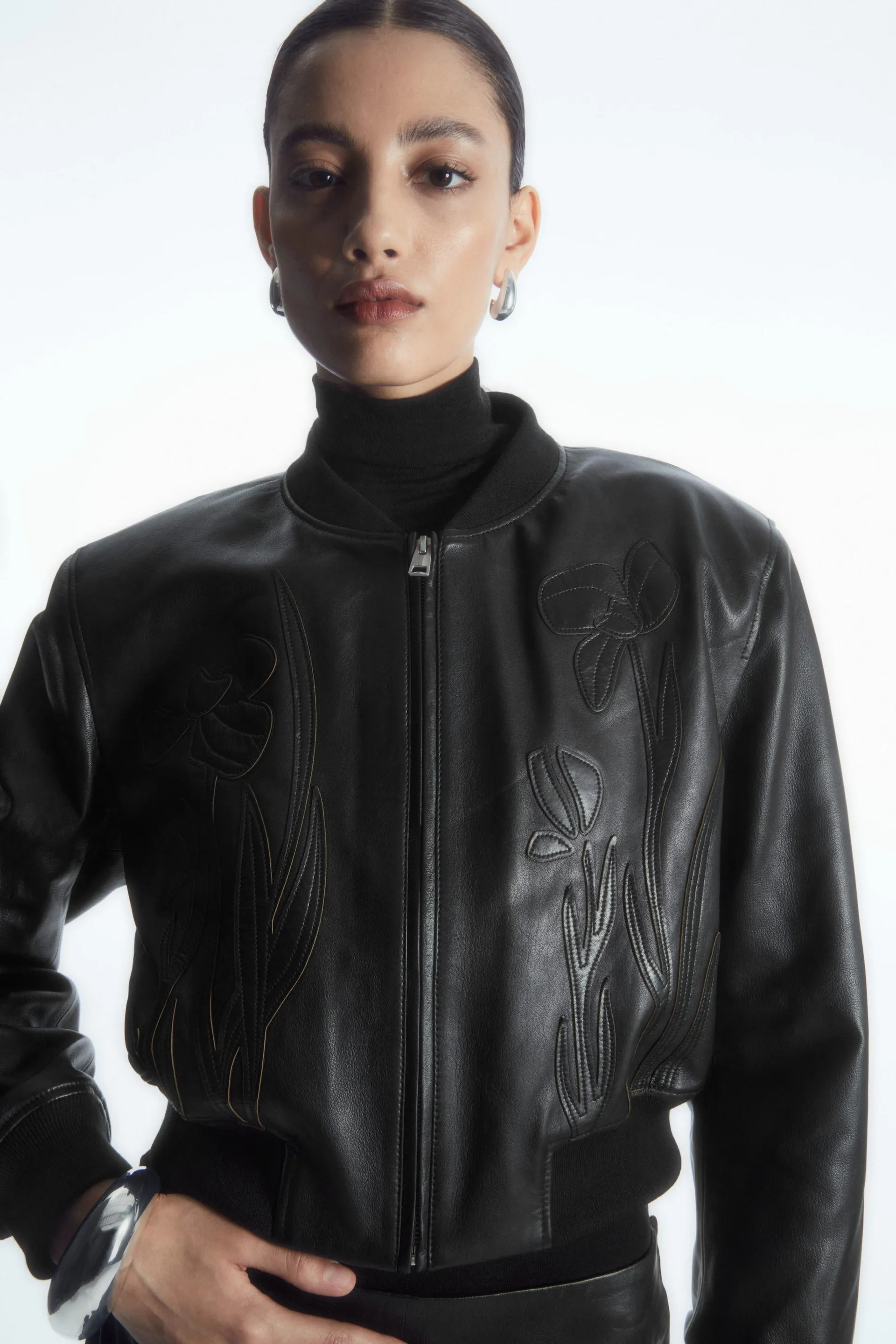 OVERSIZED APPLIQUÉD LEATHER BOMBER JACKET