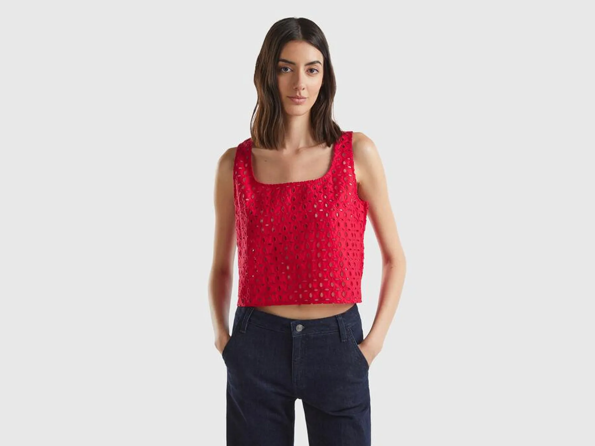 Sleeveless blouse in broderie anglaise