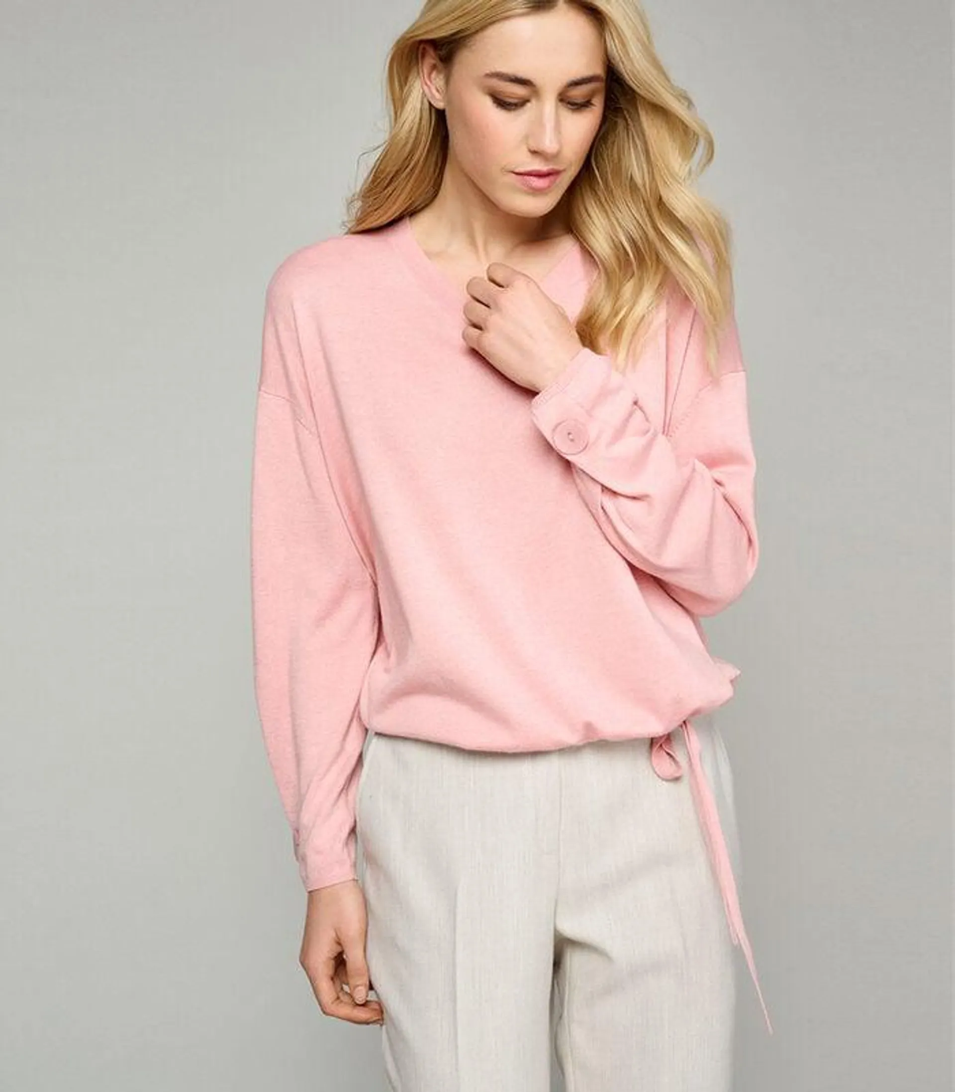 Roze gebreide pull