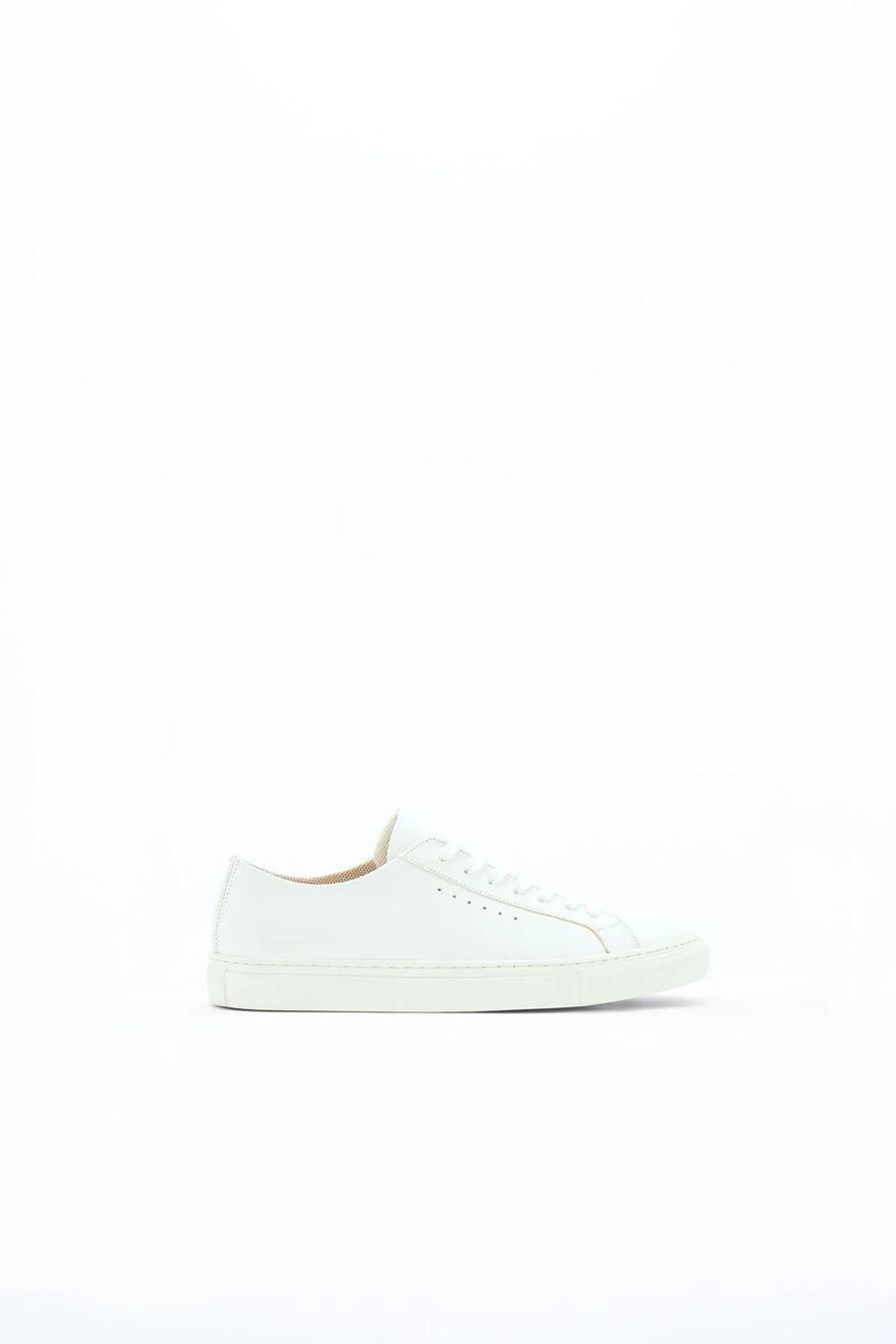 This piece is part of our Core Collection of permanent wardrobe staples. Handcrafted sneakers in biodegradable leather with a recycled rubber sole.