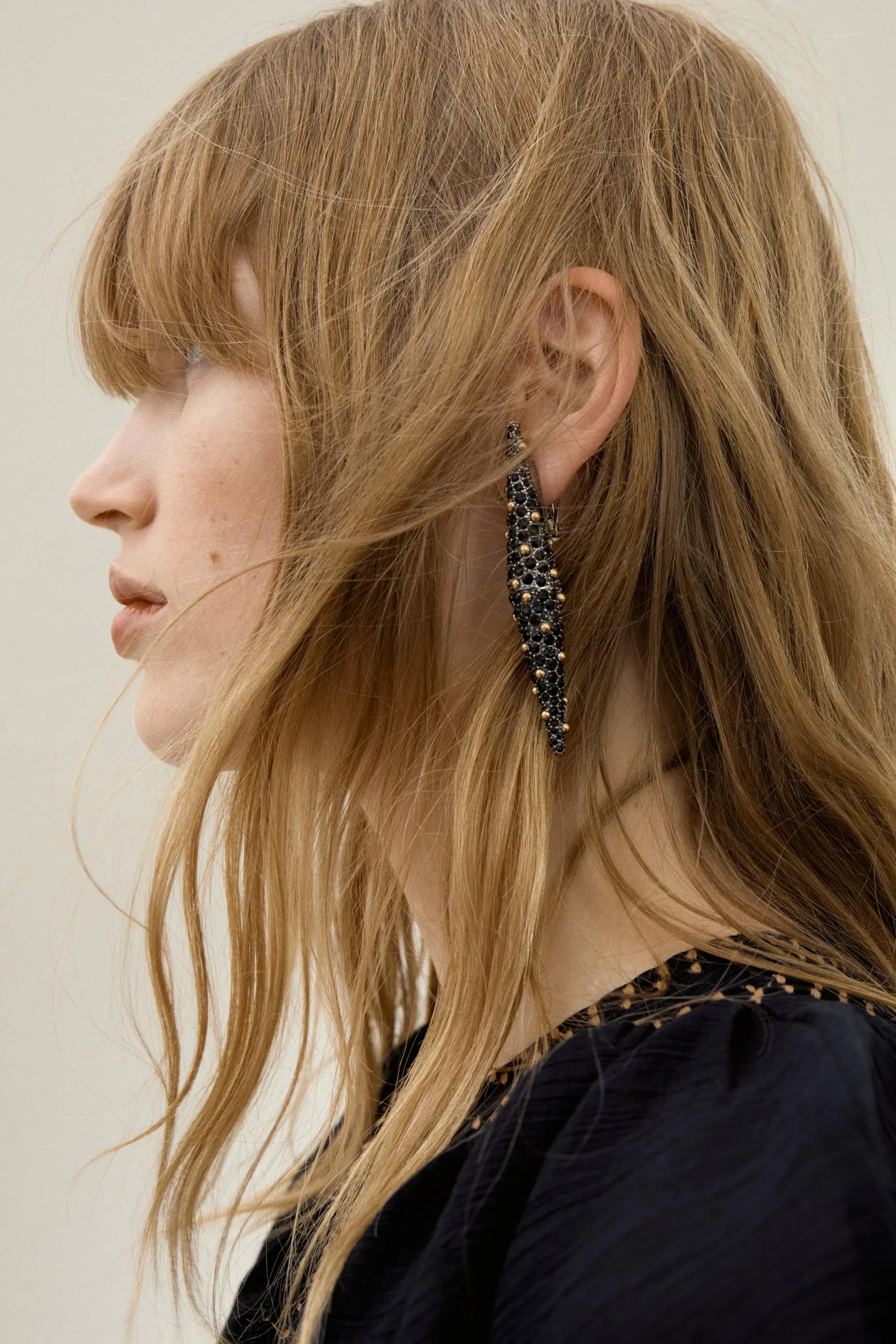 Boucles d'oreilles iconiques à clipser