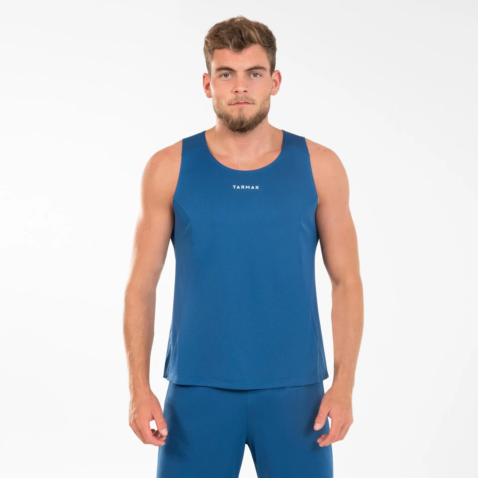 POLERA DE BÁSQUETBOL SIN MANGAS UNISEX - T100 AZUL MARINO