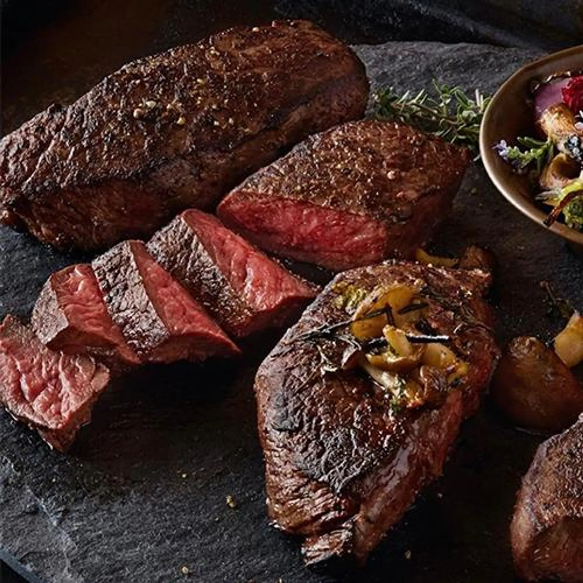 BISON STRIPLOIN $32.85/lb (approx. $15.40 ea)