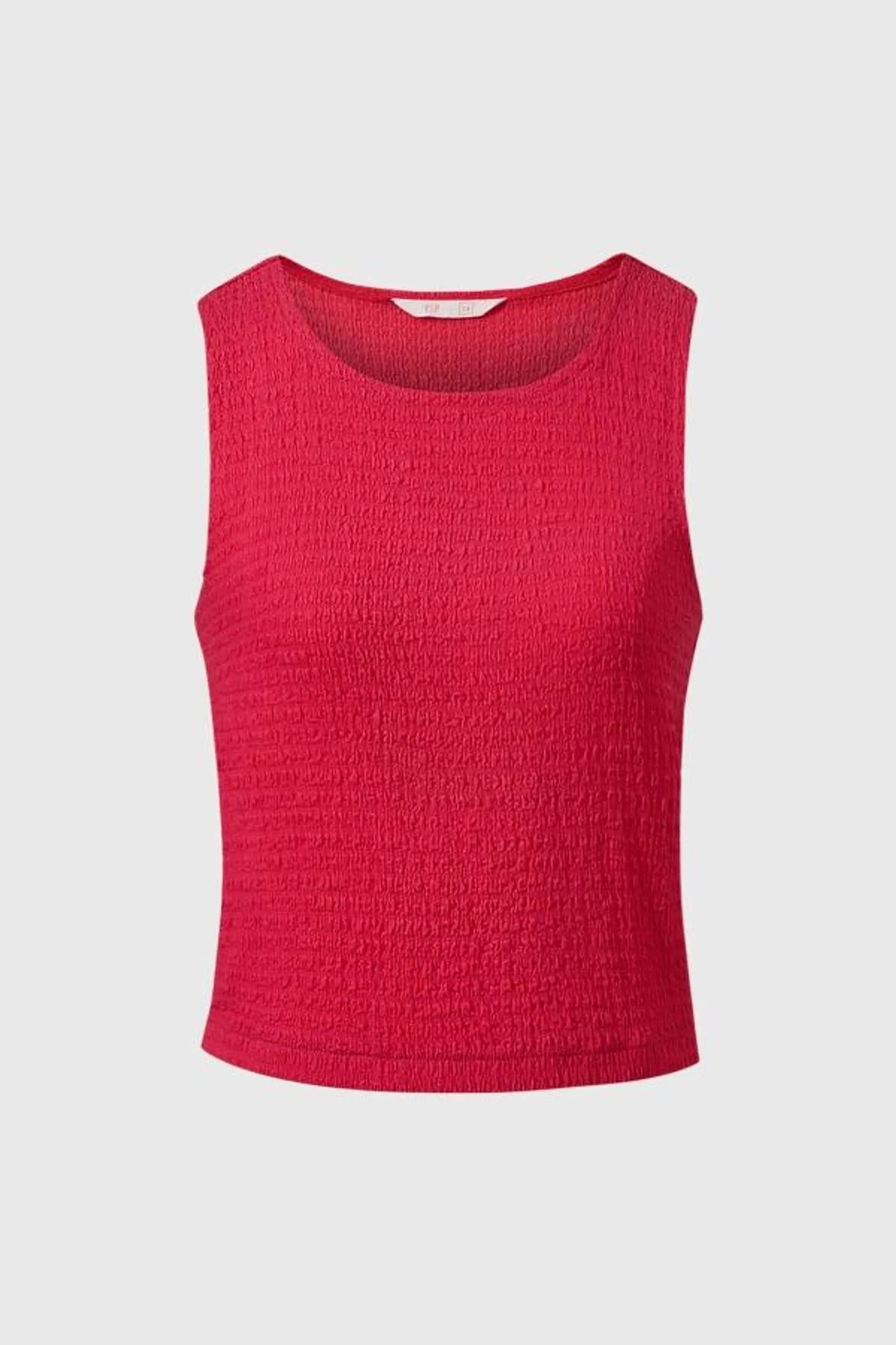 Polera niÑa tipo peto textura fucsia