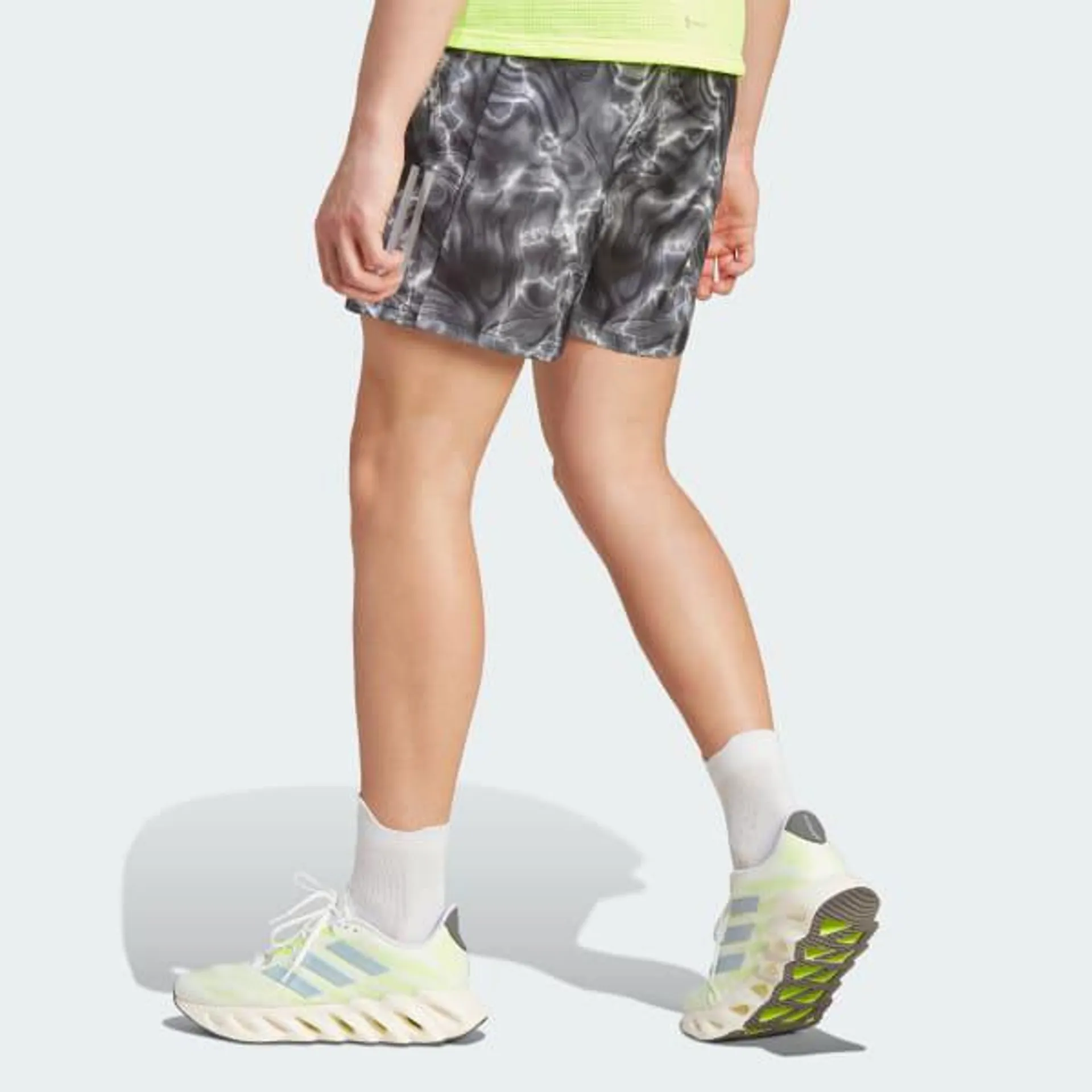 Shorts Own the Run Estampados