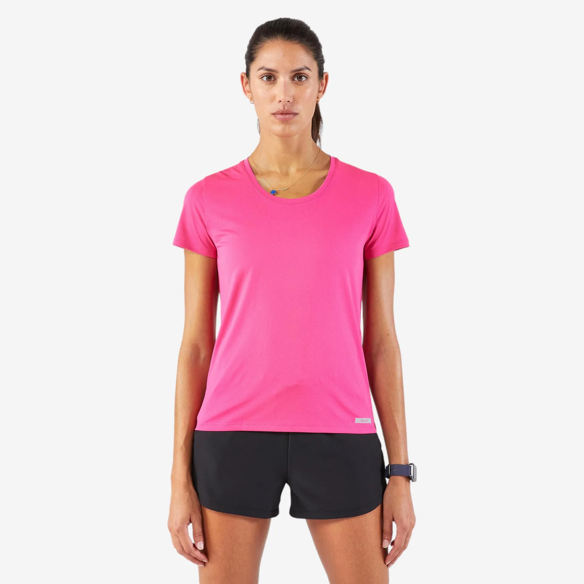 POLERA DE RUNNING TRANSPIRABLE MUJER KIPRUN RUN 100 ROSA FUCSIA