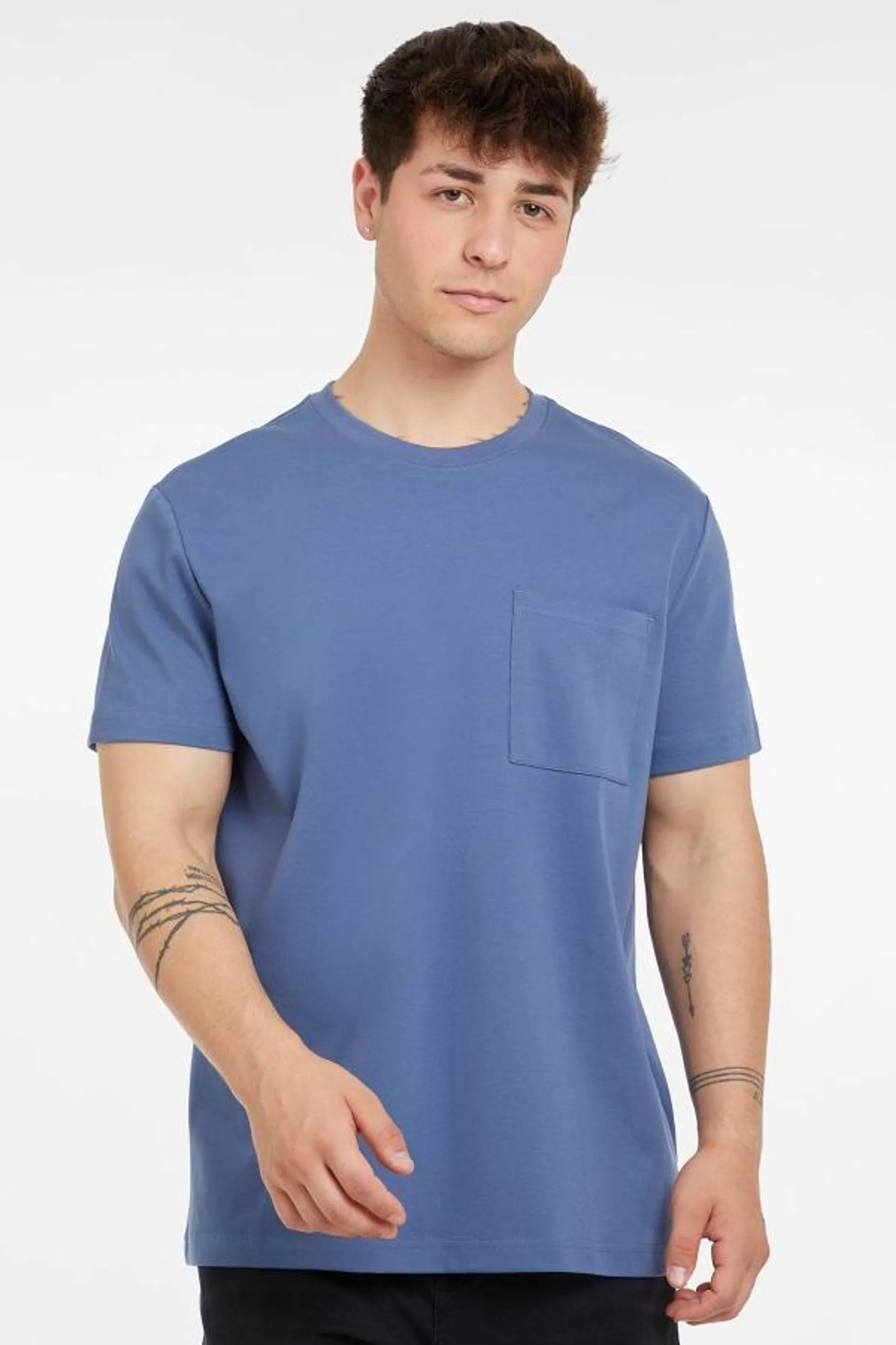 Polera repelente a agua y manchas azul piedra