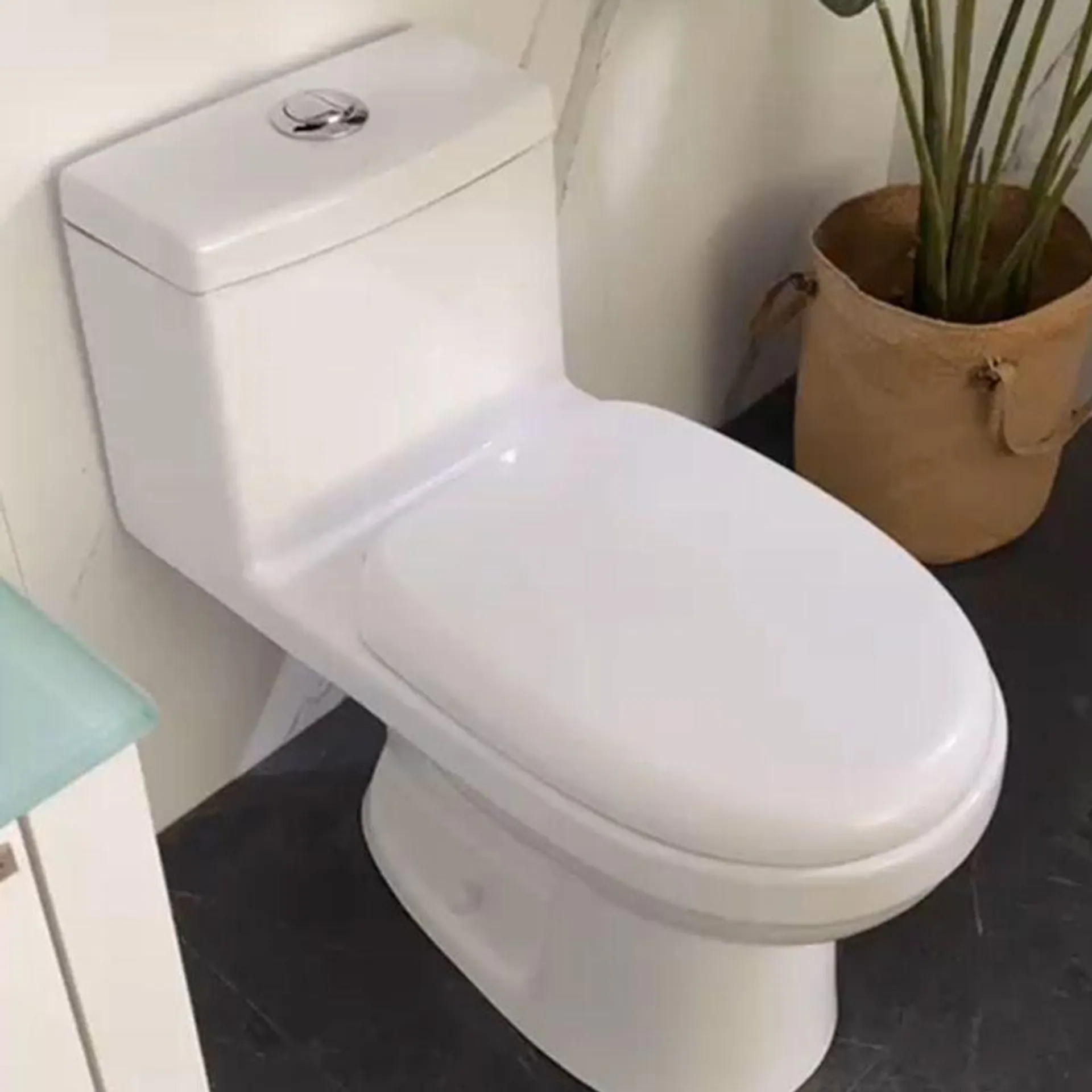 WC Op Home descarga a piso con asiento y fijaciones