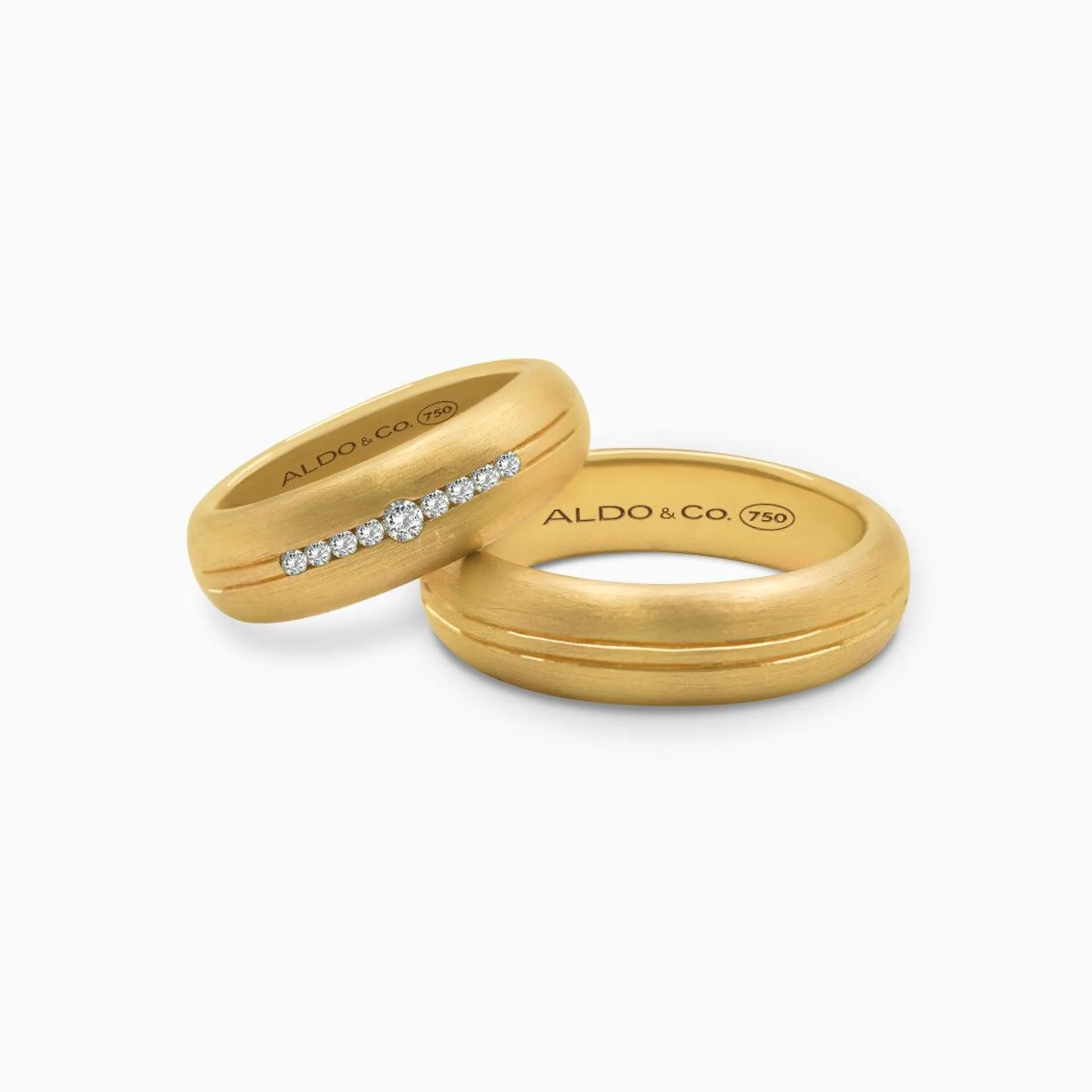 Alianzas en oro amarillo de 18K media caña