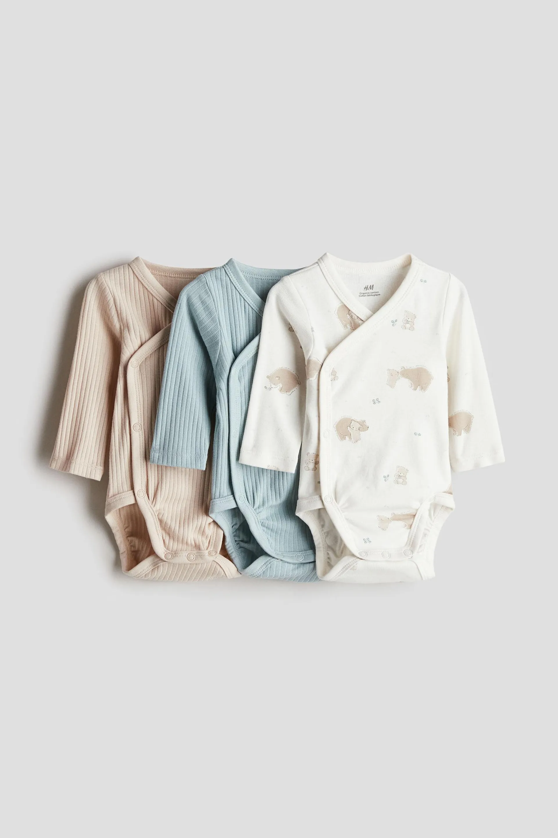 Pack de 3 bodies de frente cruzado - H&M Colombia | Moda online, ropa de Mujer, Hombre, Bebé y  Niños | H&M CO