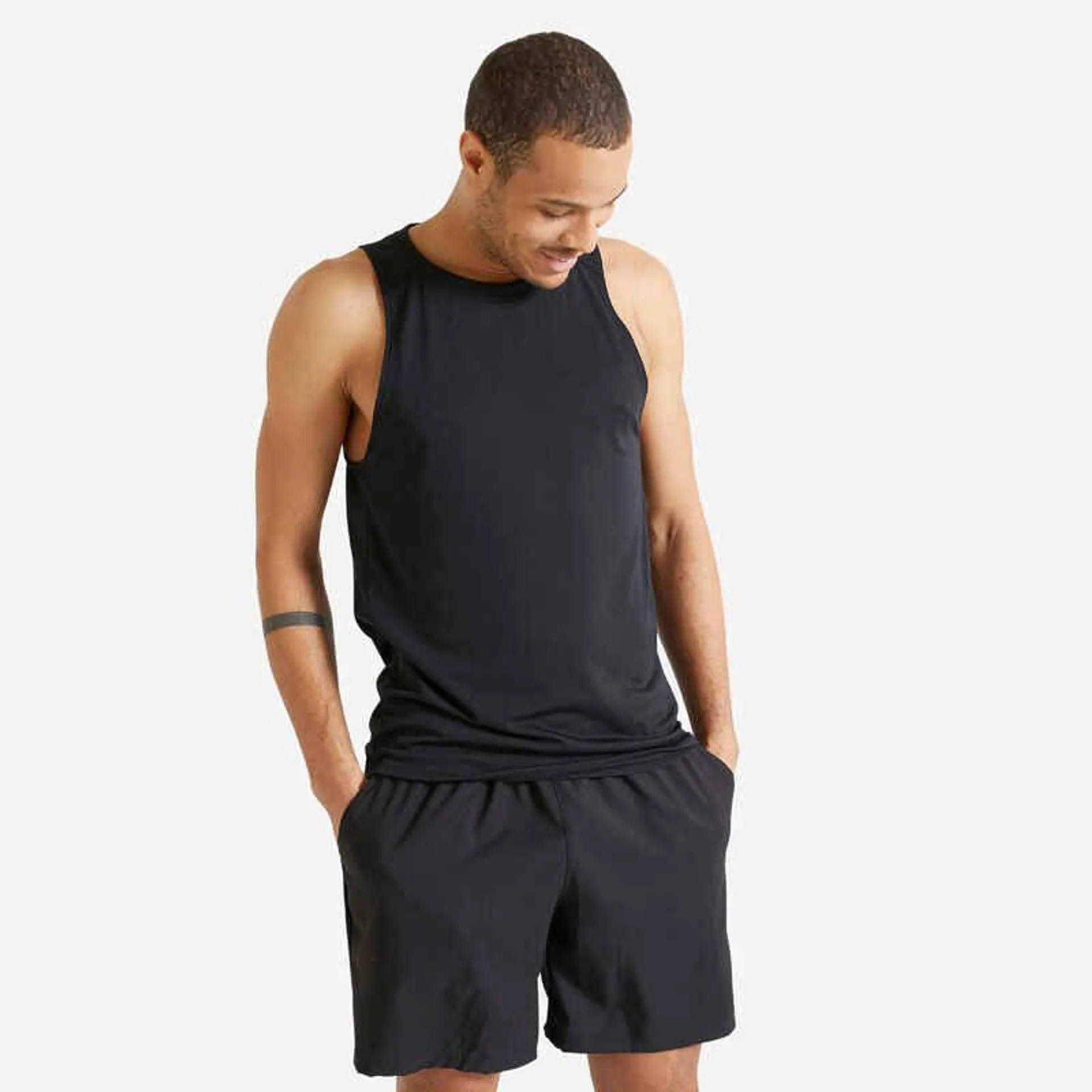 Polera Sin Mangas Fitness Essentiel Hombre Negro Transpirable Cuello Redondo