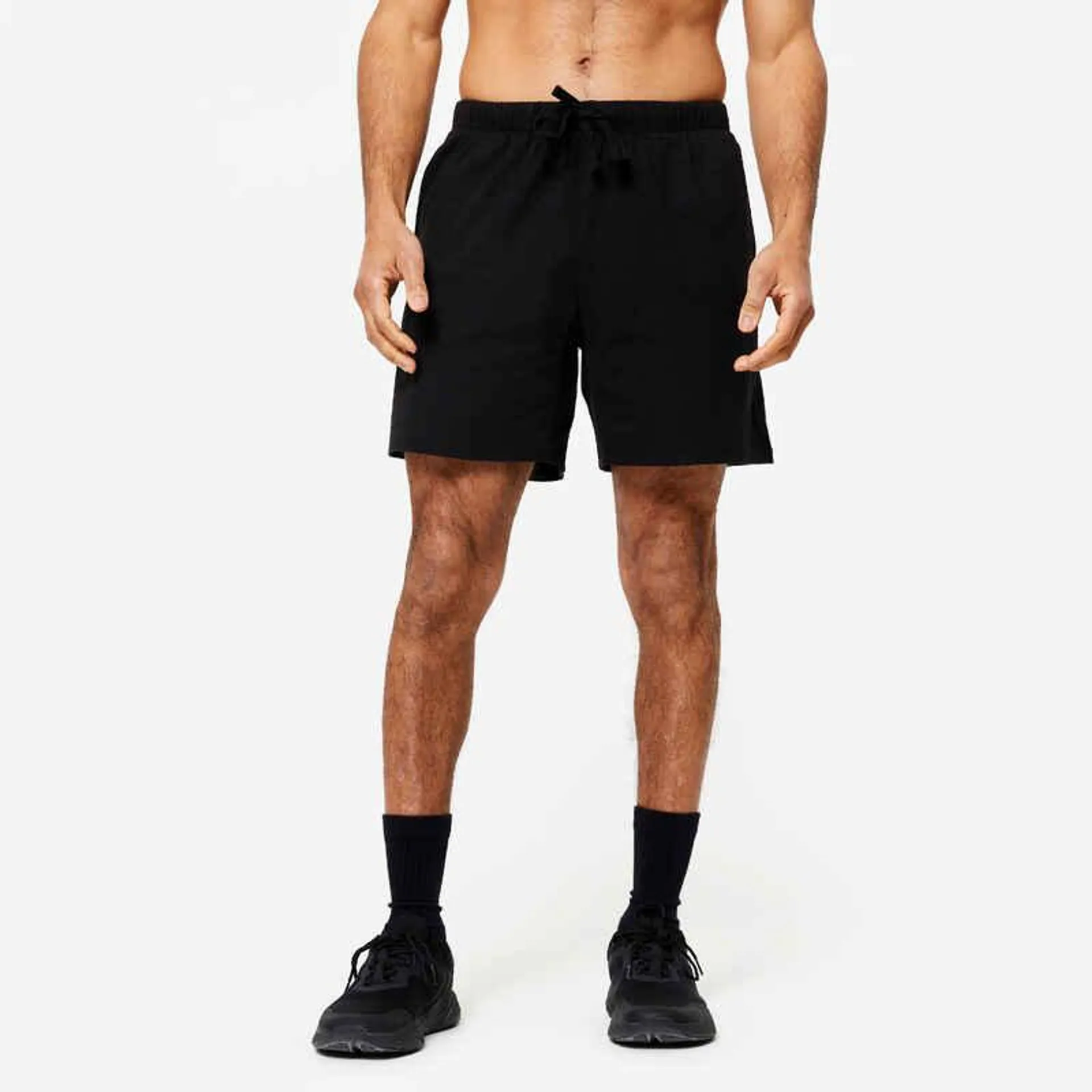 Pantaloneta de fitness con bolsillos para Hombre Domyos 100 negro