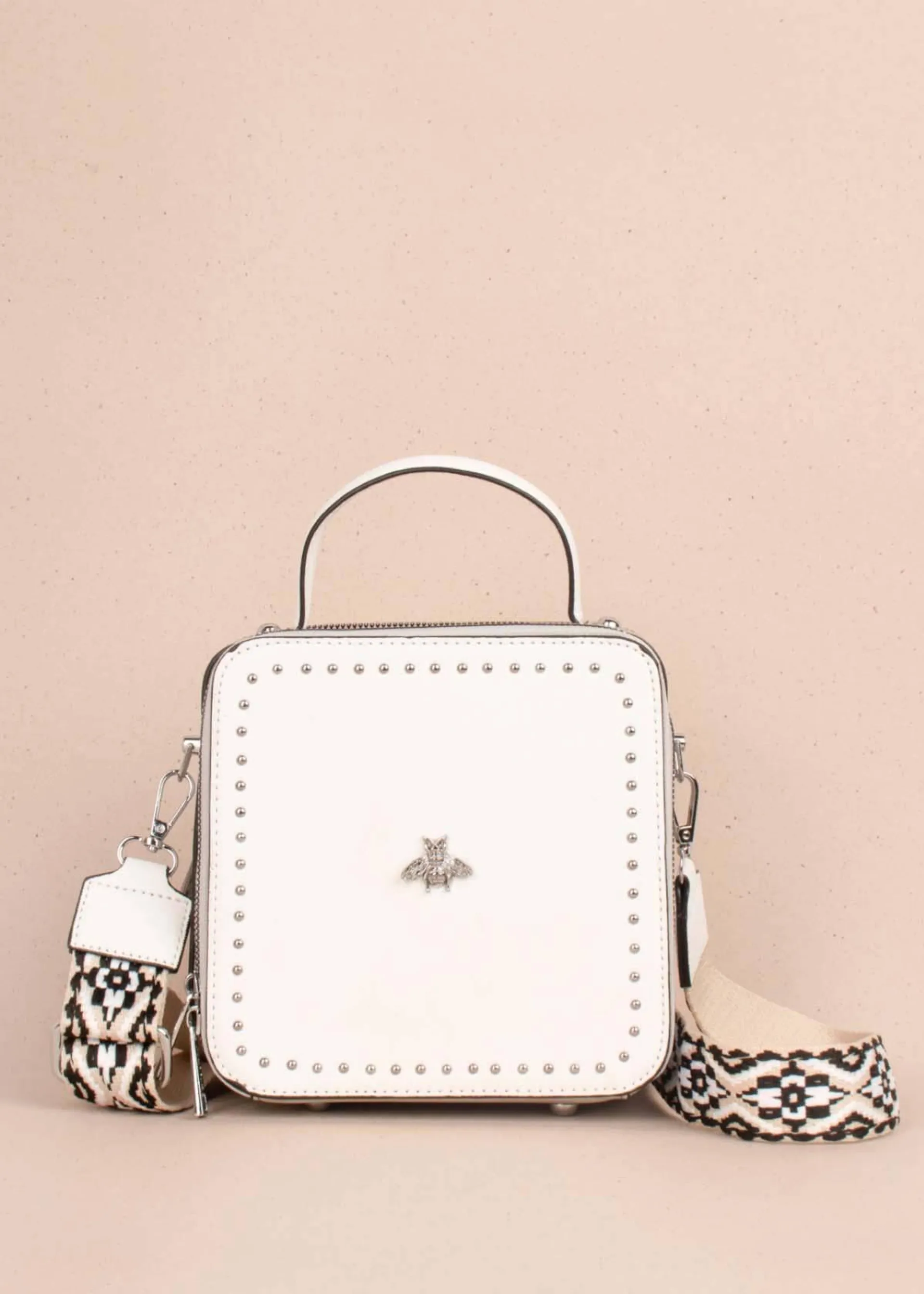 Bolso tipo bandolera color blanco con taches 104389