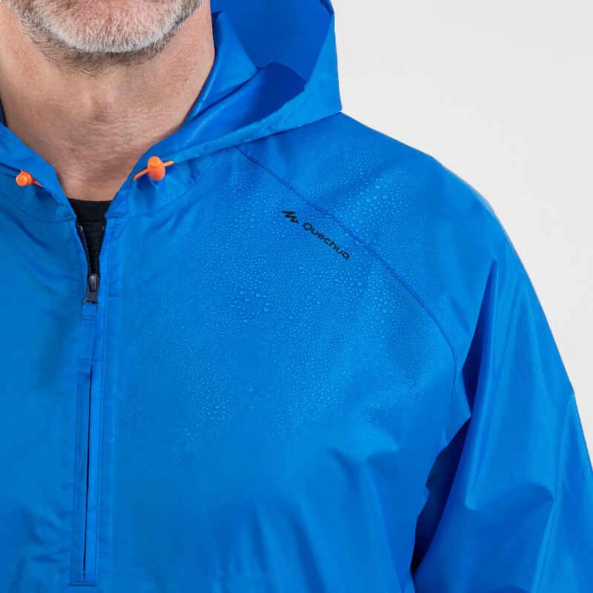 Chaqueta impermeable cierre medio de senderismo para Hombre Quechua NH100 azul