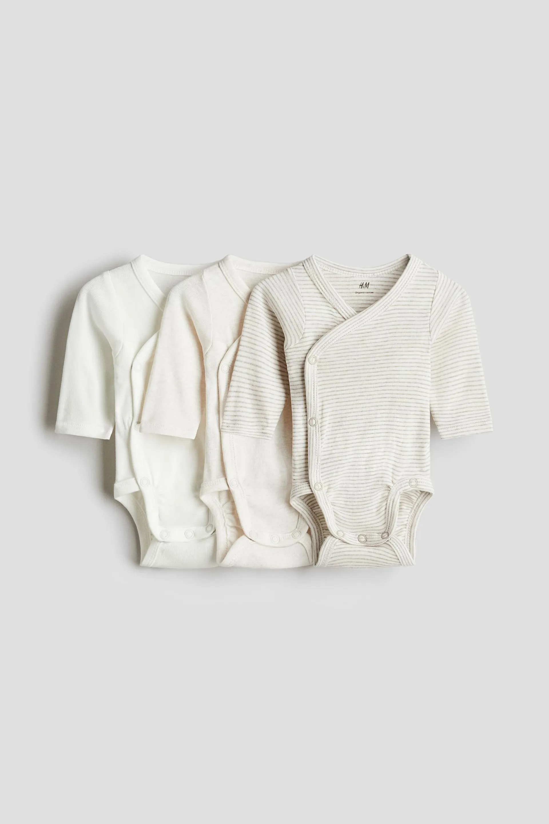 Pack de 3 bodies de frente cruzado - H&M Colombia | Moda online, ropa de Mujer, Hombre, Bebé y  Niños | H&M CO