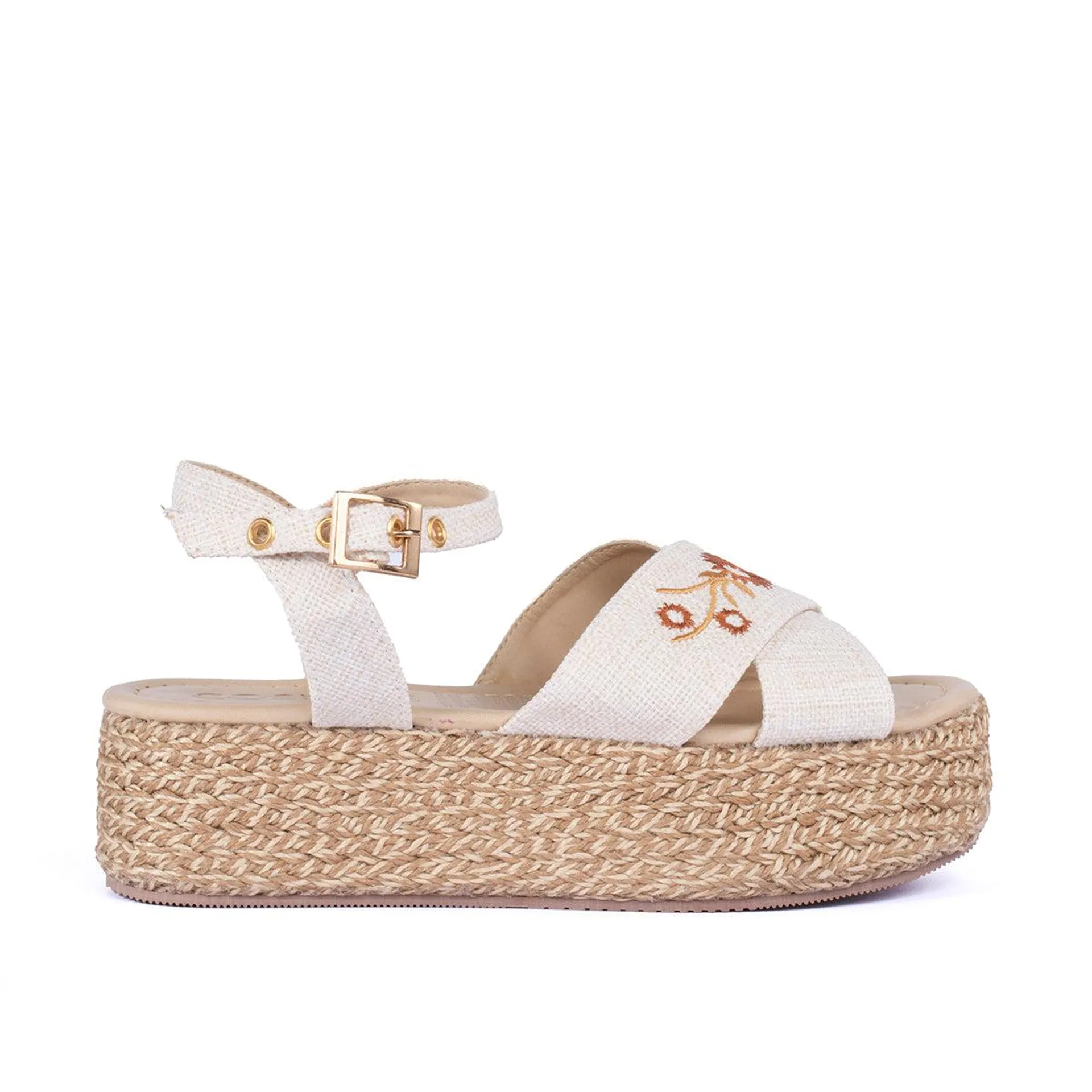 Sandalias color beige con capellada textil, empeine con bordado y suela en yute