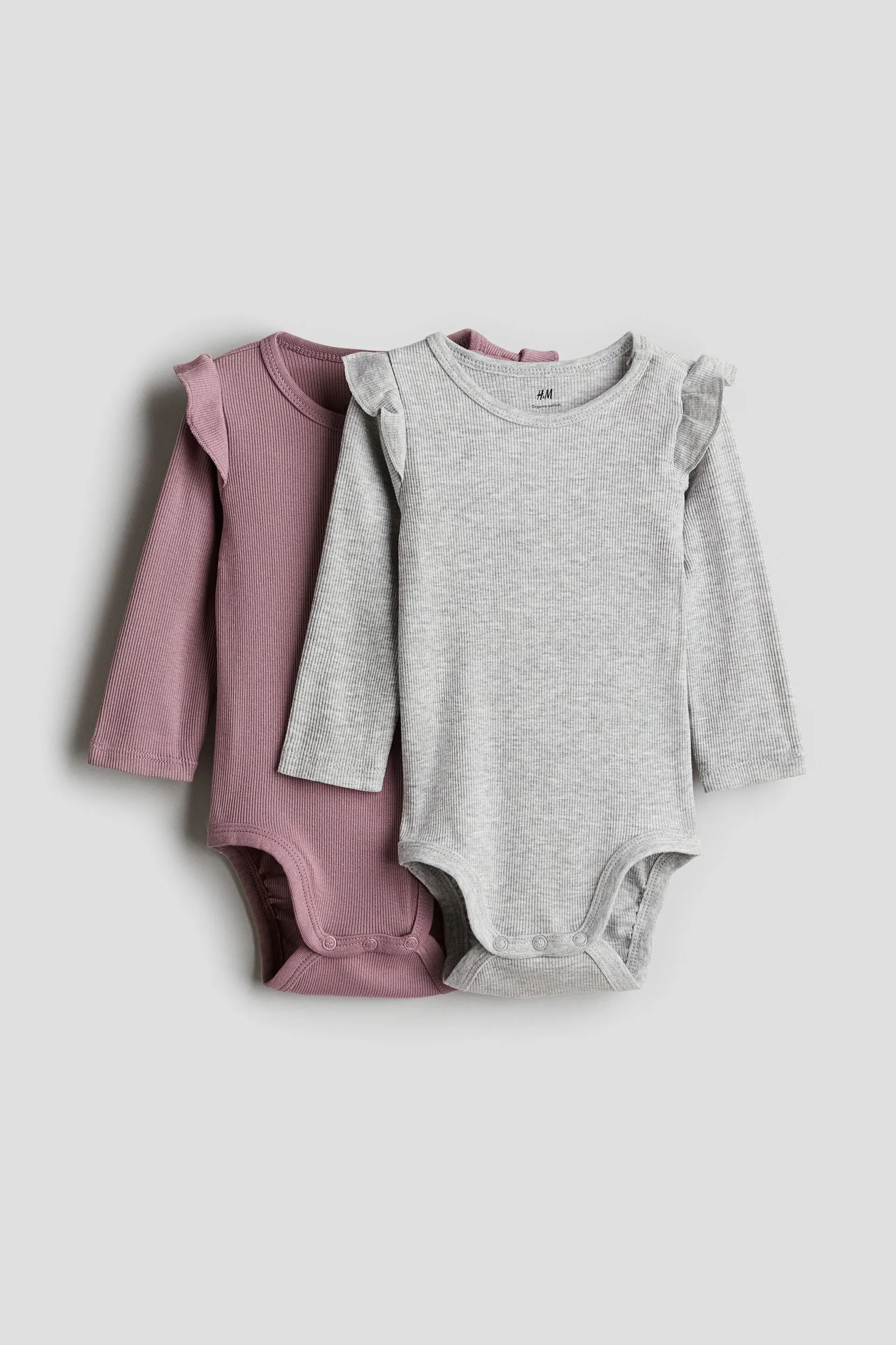 Pack 2 bodies de mangas largas - H&M Colombia | Moda online, ropa de Mujer, Hombre, Bebé y  Niños | H&M CO