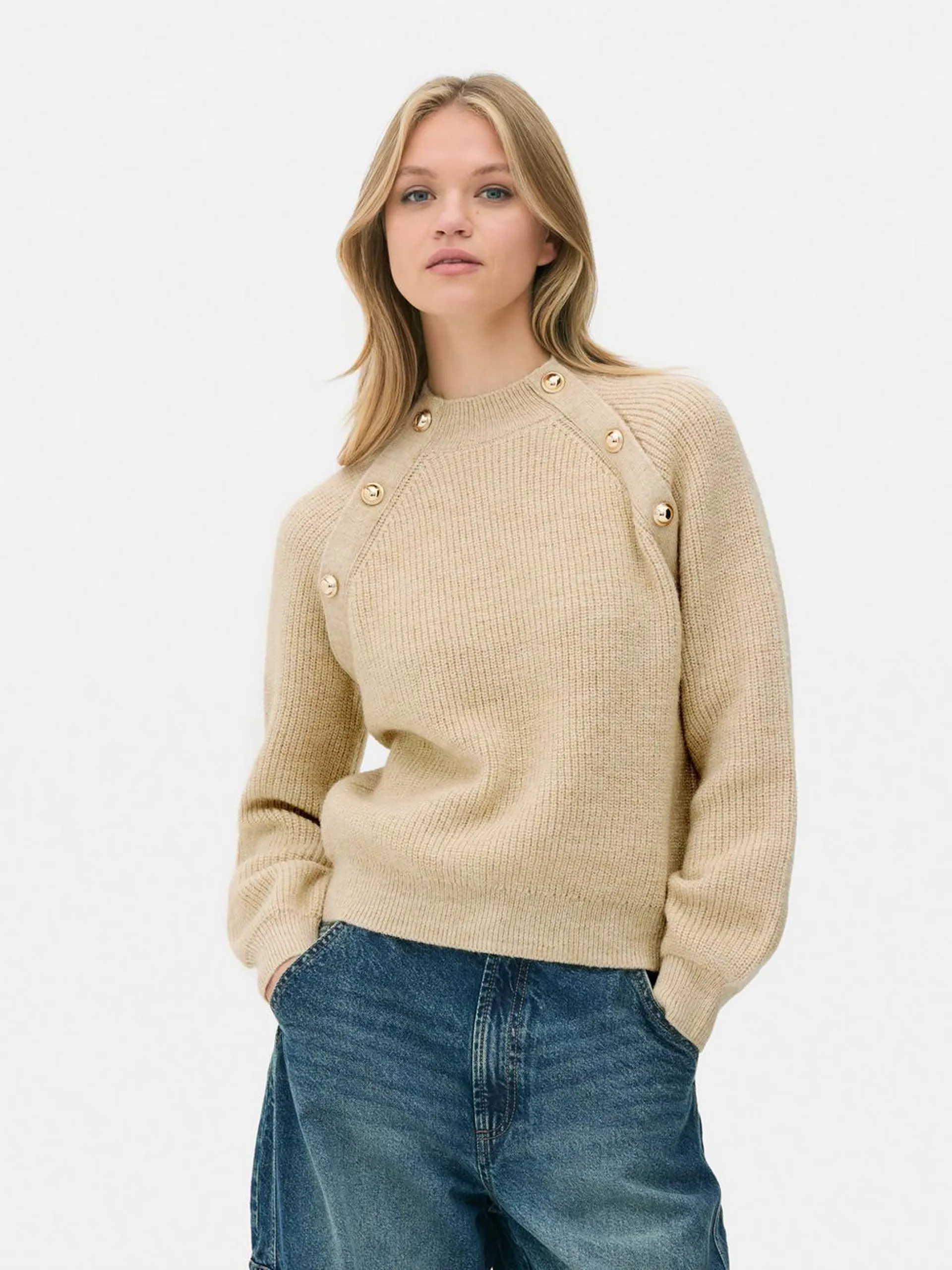 Glitzernder Pullover mit Knöpfen