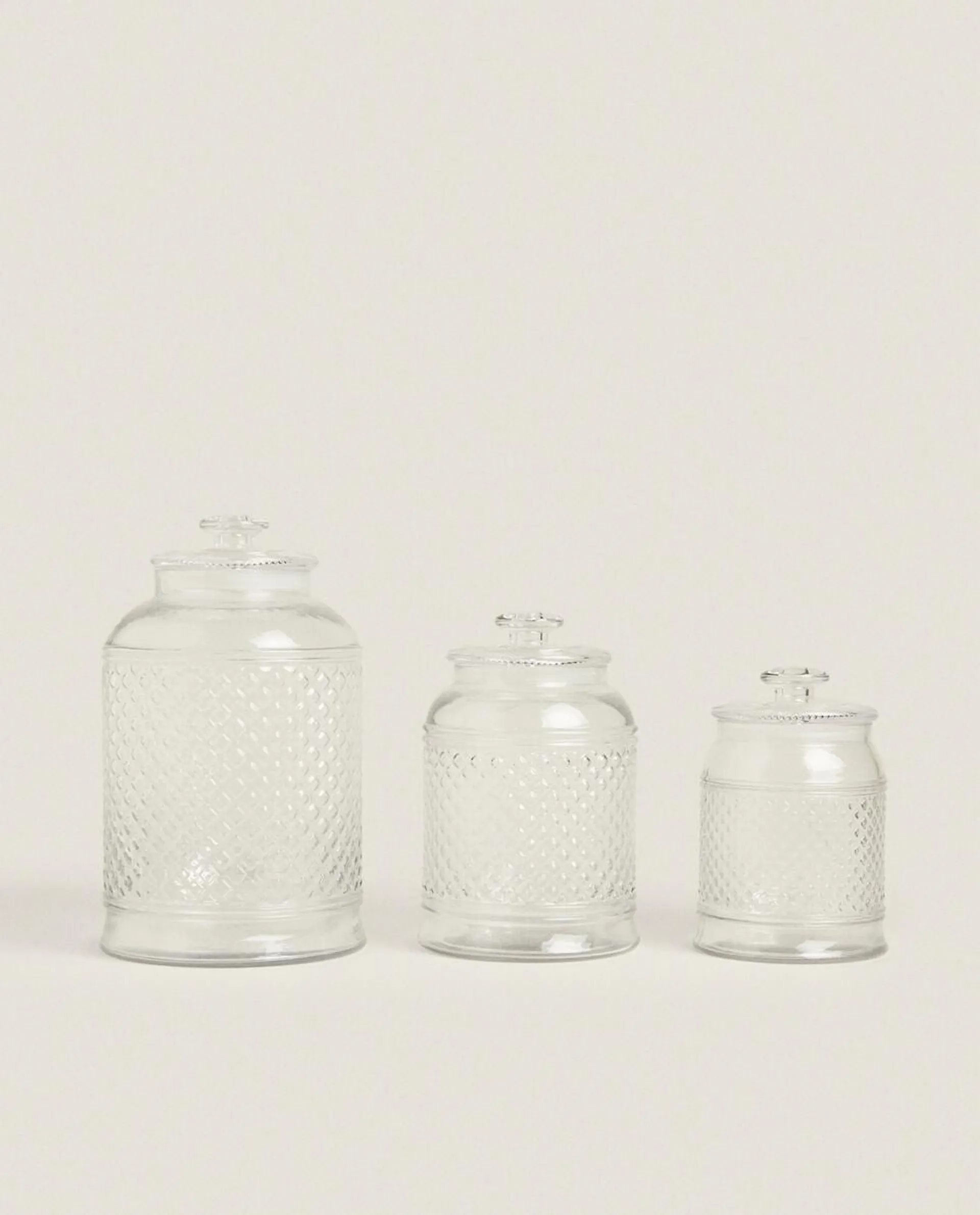 RAISED DESIGN GLASS JAR WITH LID