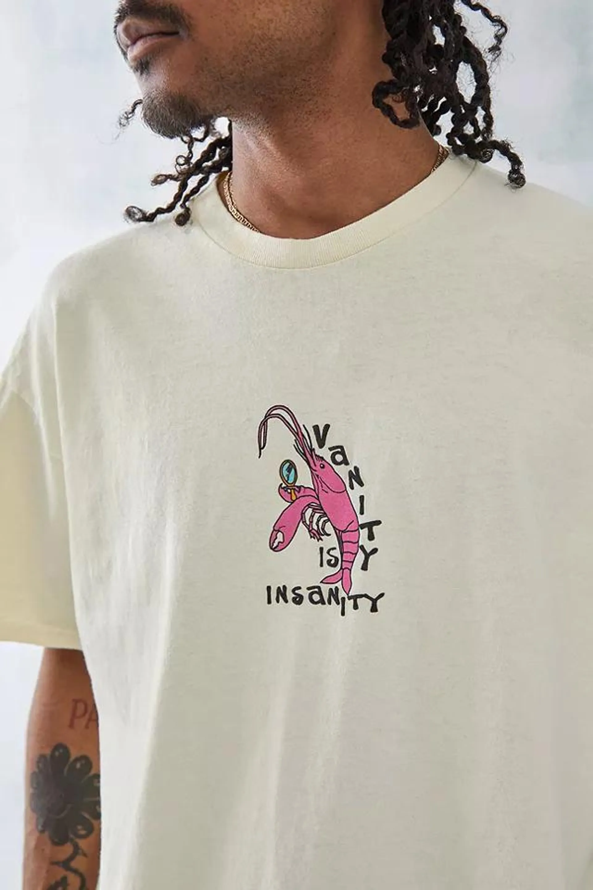 UO – T-Shirt „Vanity Is Insanity“