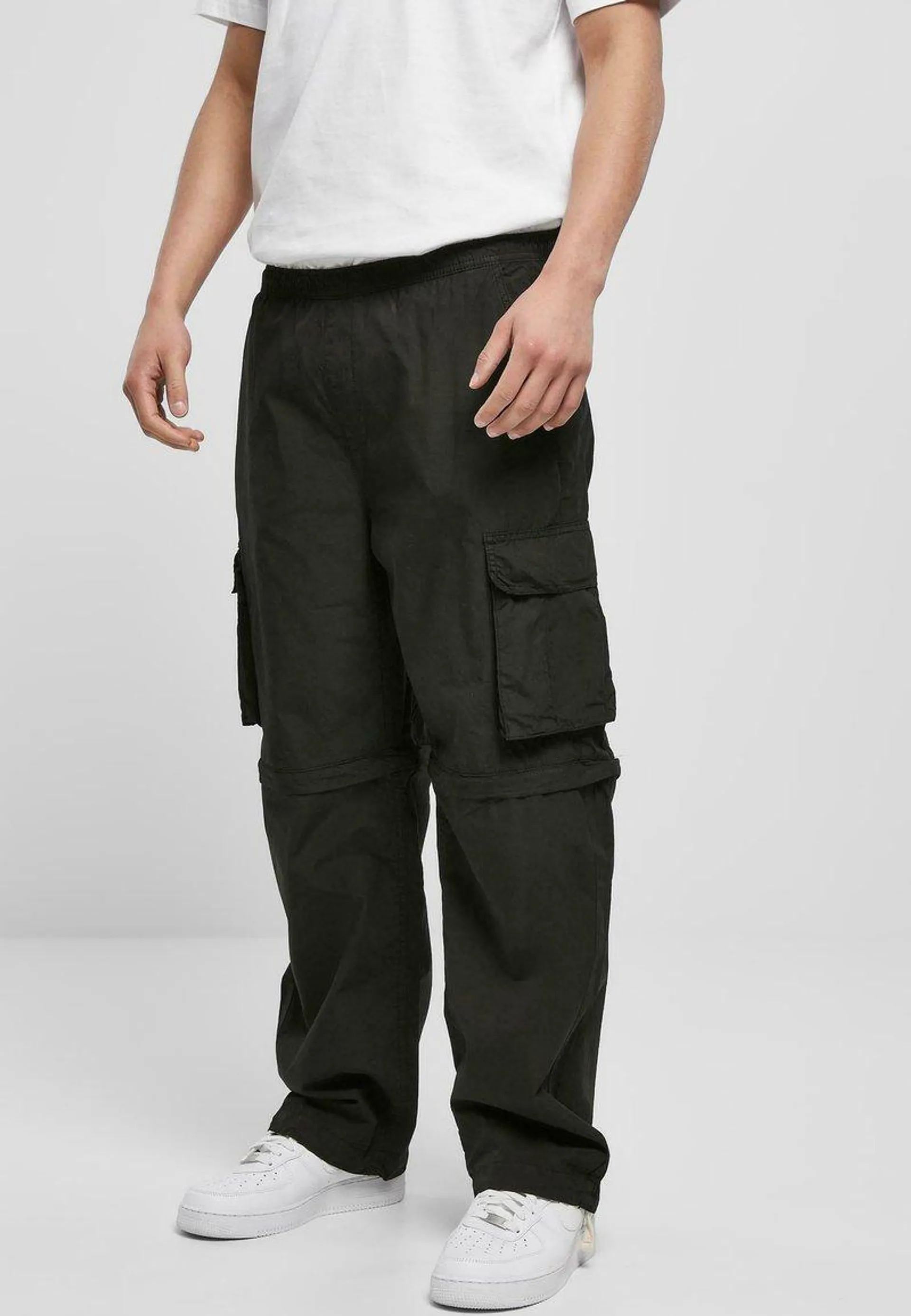 ZIP AWAY - Cargo trousers - black