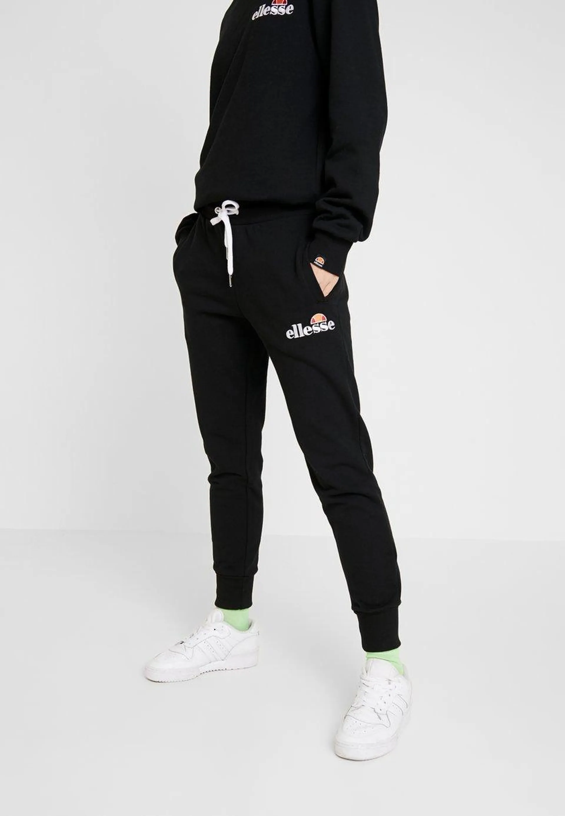 FRIVOLA - Tracksuit bottoms - black