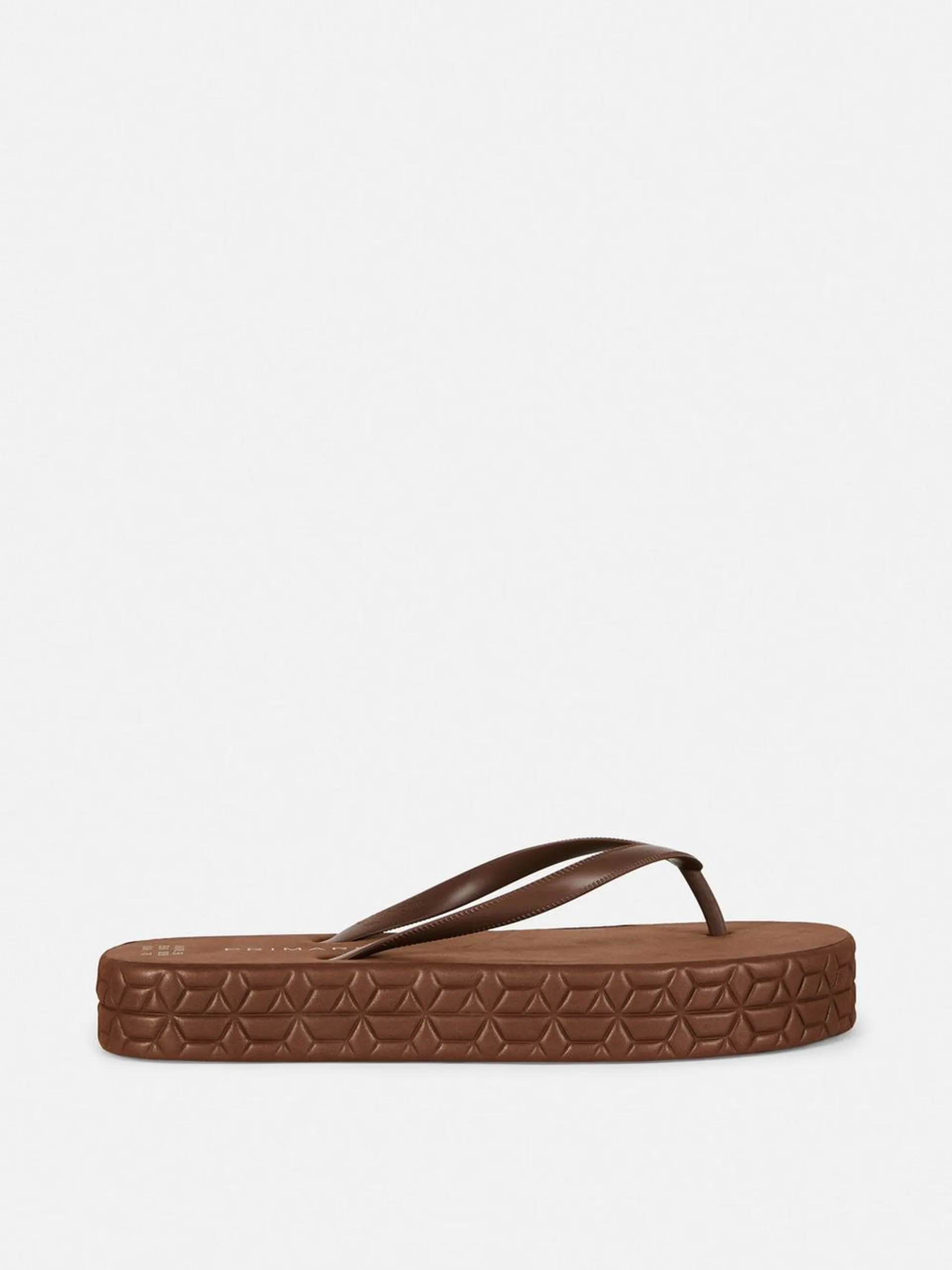 Gestreifte Plateau-Flipflops
