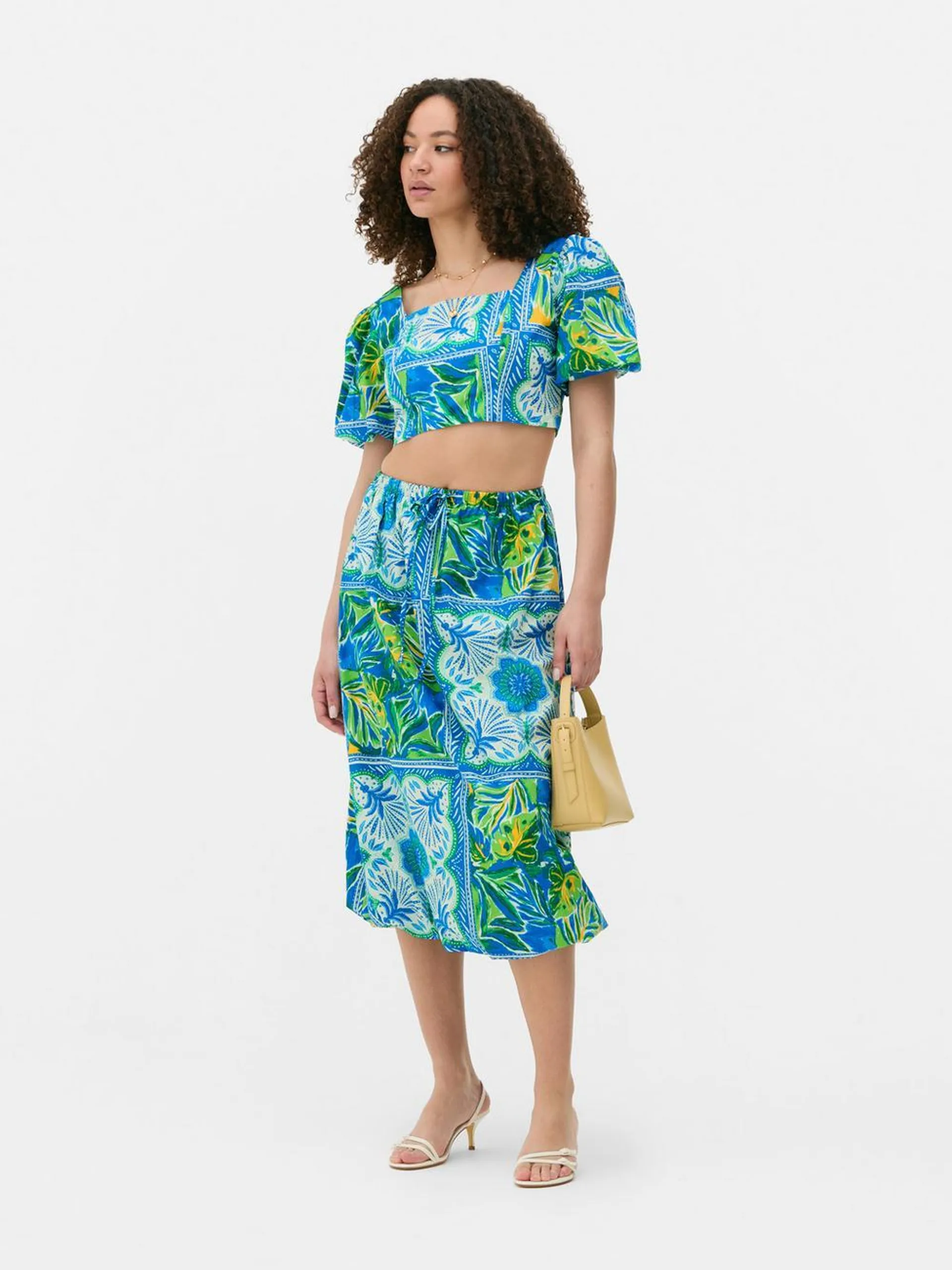 Falda globo midi con estampado tropical