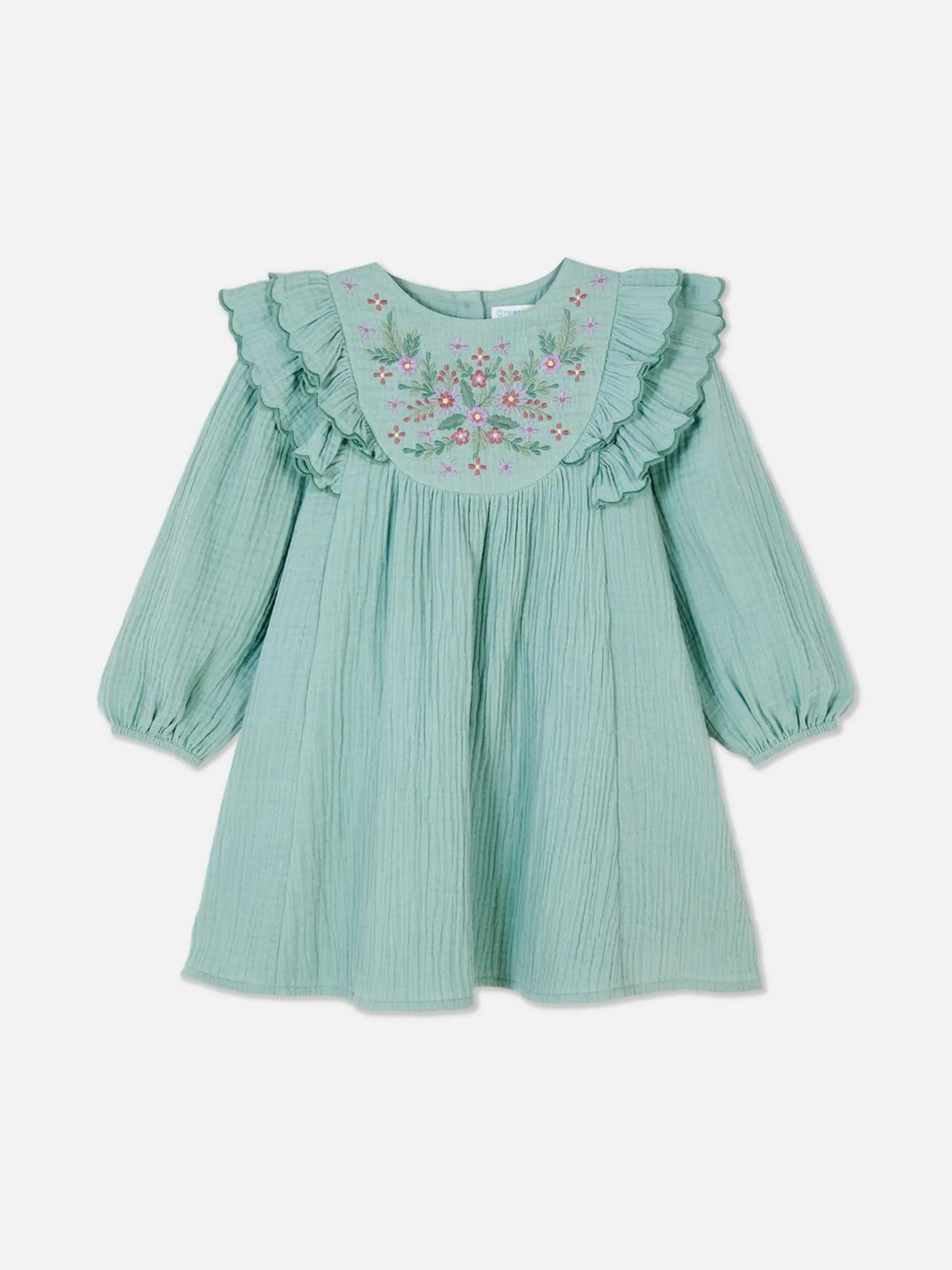 Vestido de punto smock festoneado con bordado floral