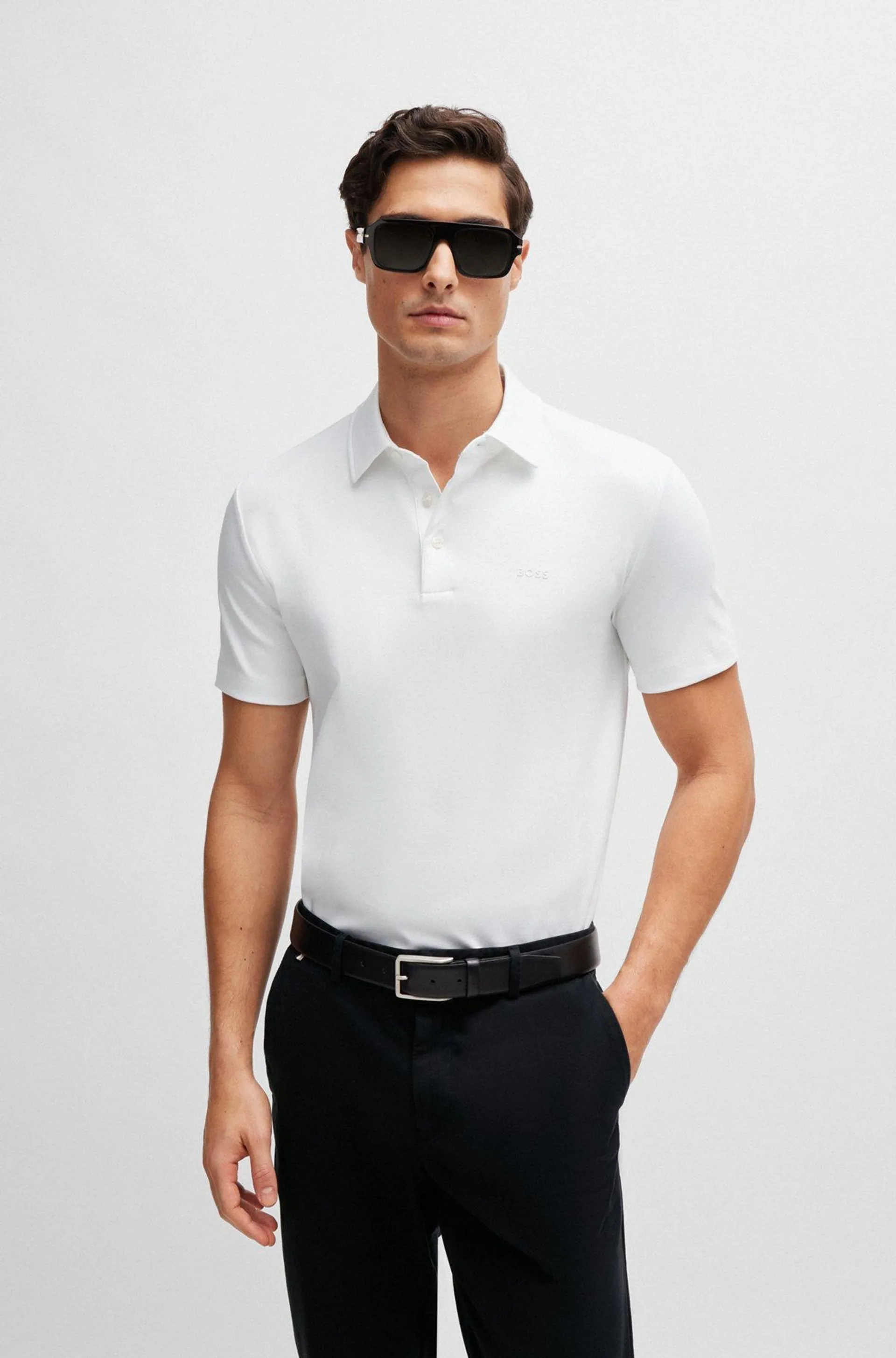 Polo slim fit de algodón interlock con logo de goma