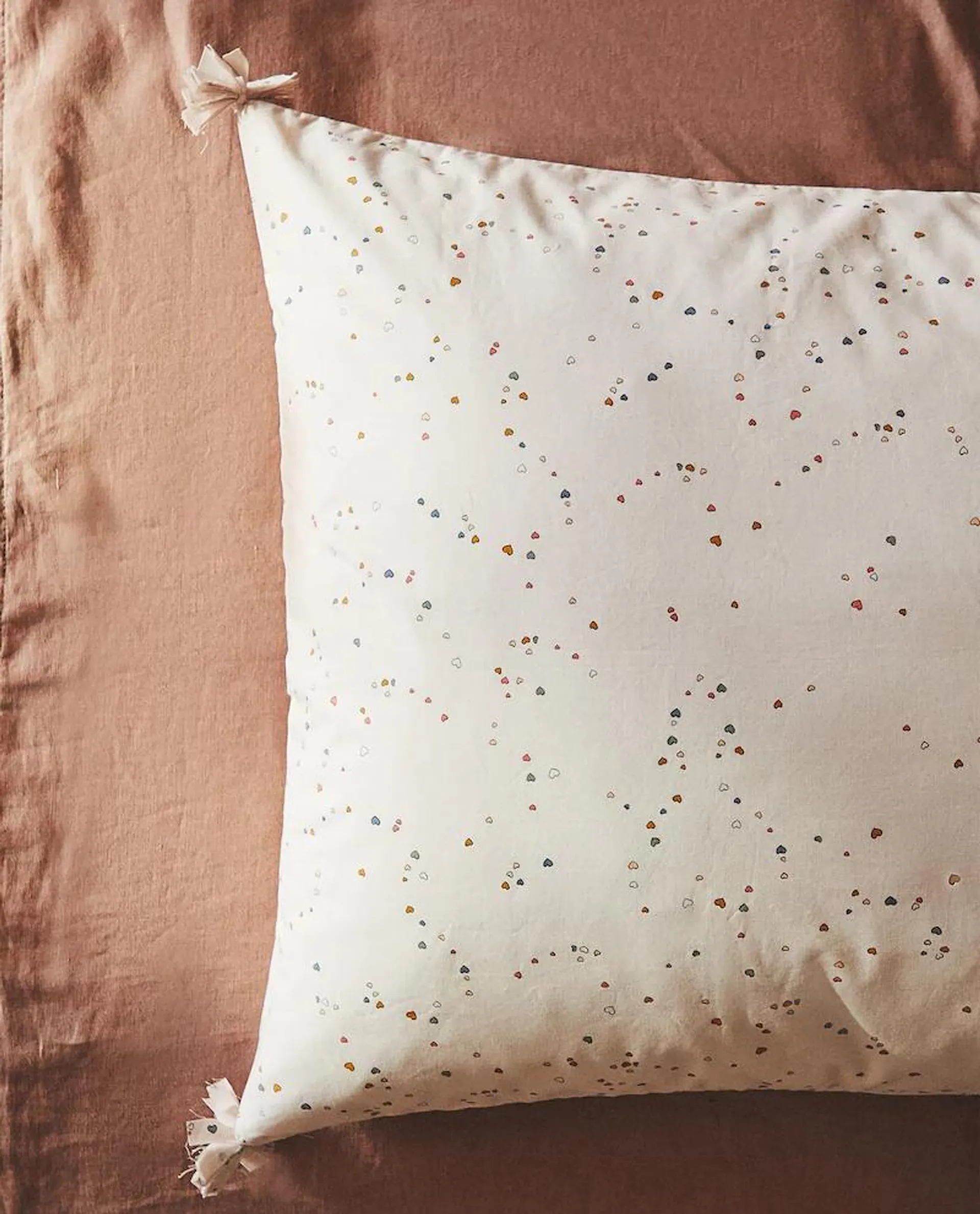 CHILDREN’S MULTICOLOURED HEART PILLOWCASE