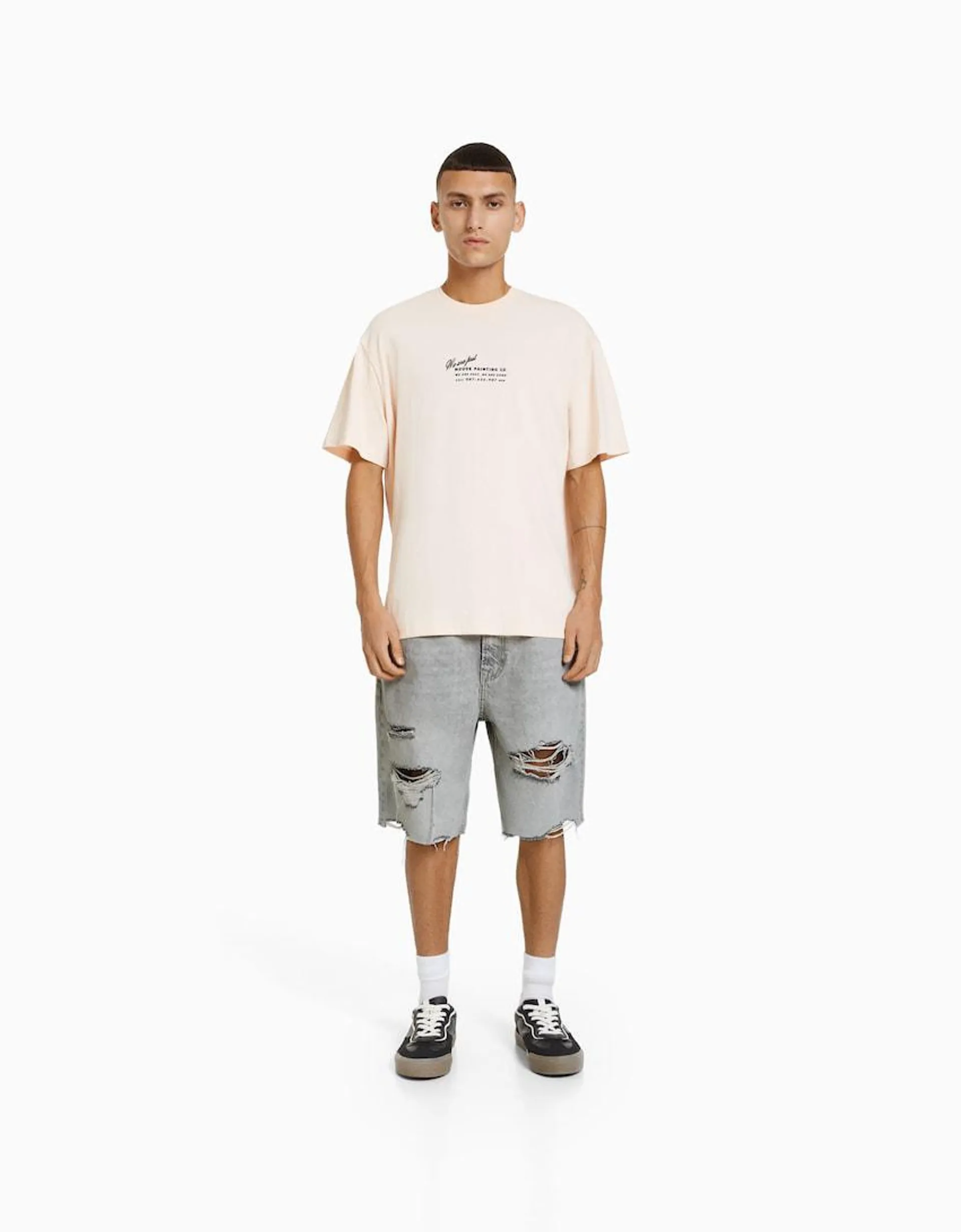 Slim fit ripped denim Bermuda shorts