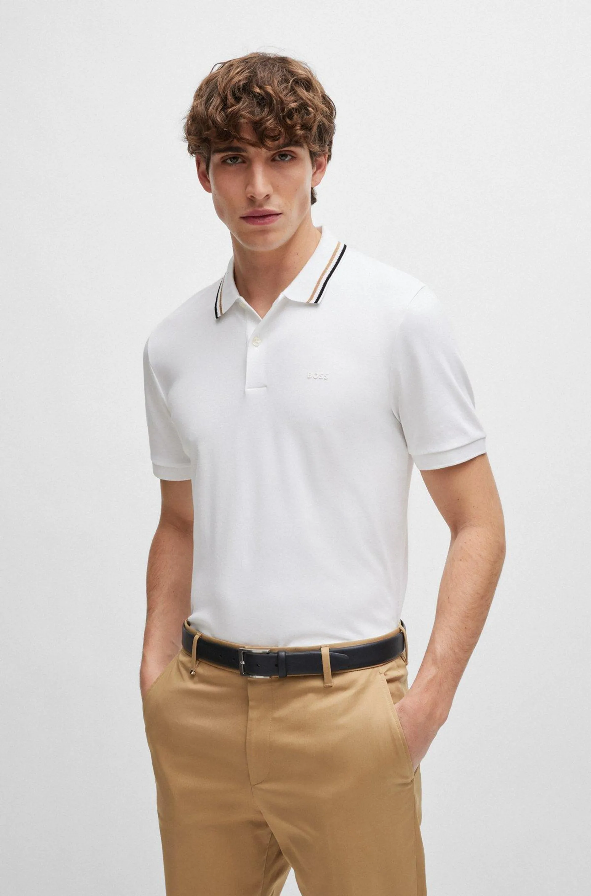 Polo slim fit de algodón con cuello a rayas