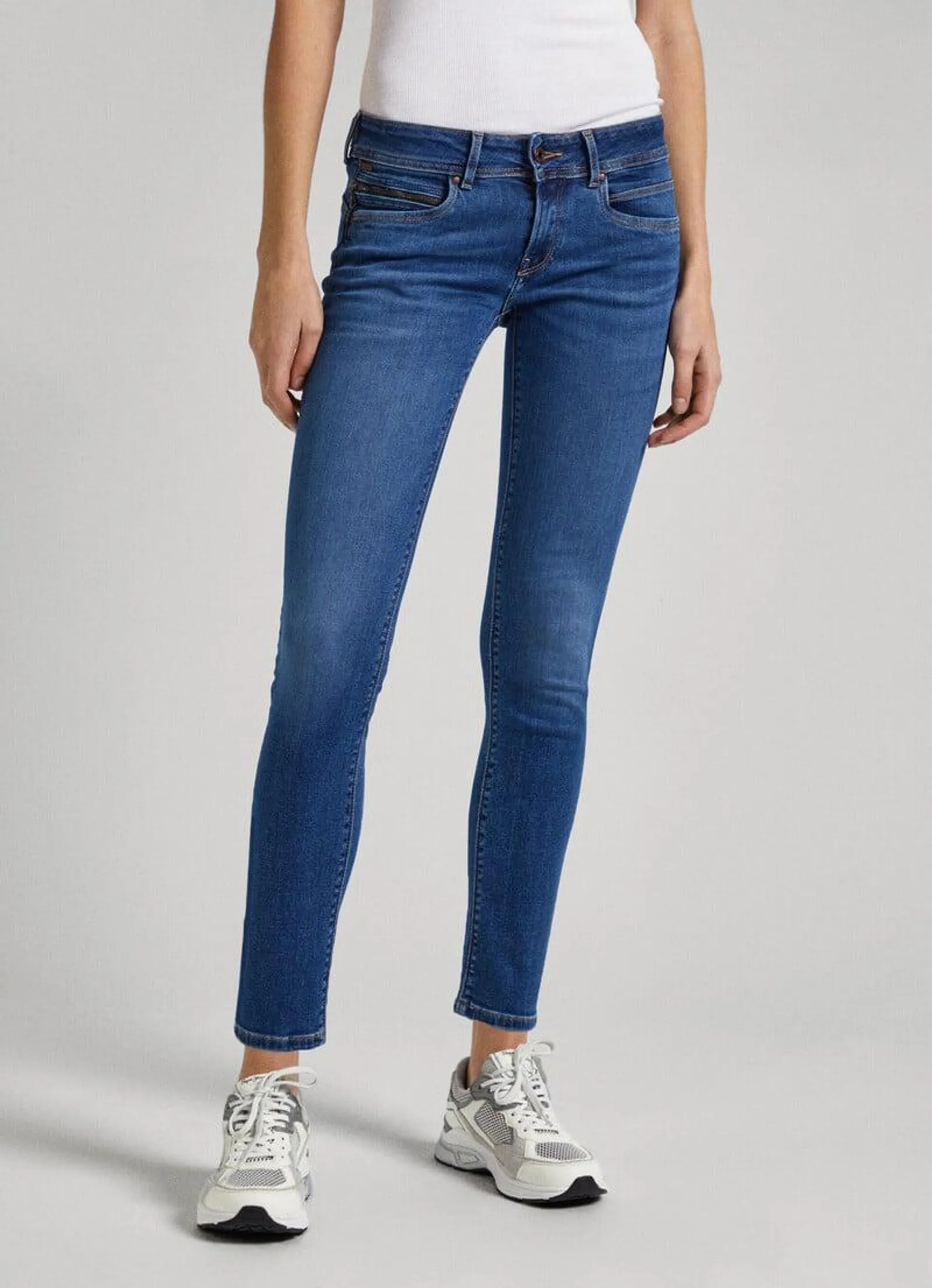 JEANS FIT SLIM Y TIRO BAJO - NEW BROOKE