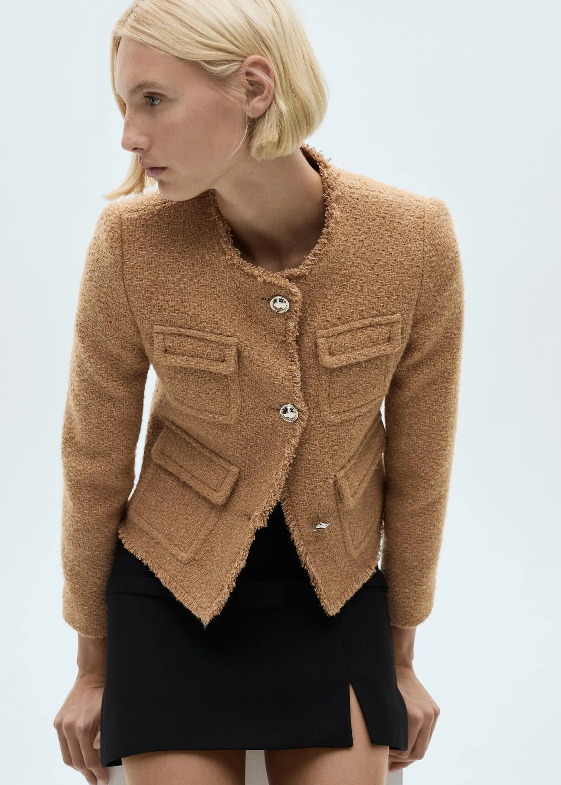 Chaqueta tweed bolsillos