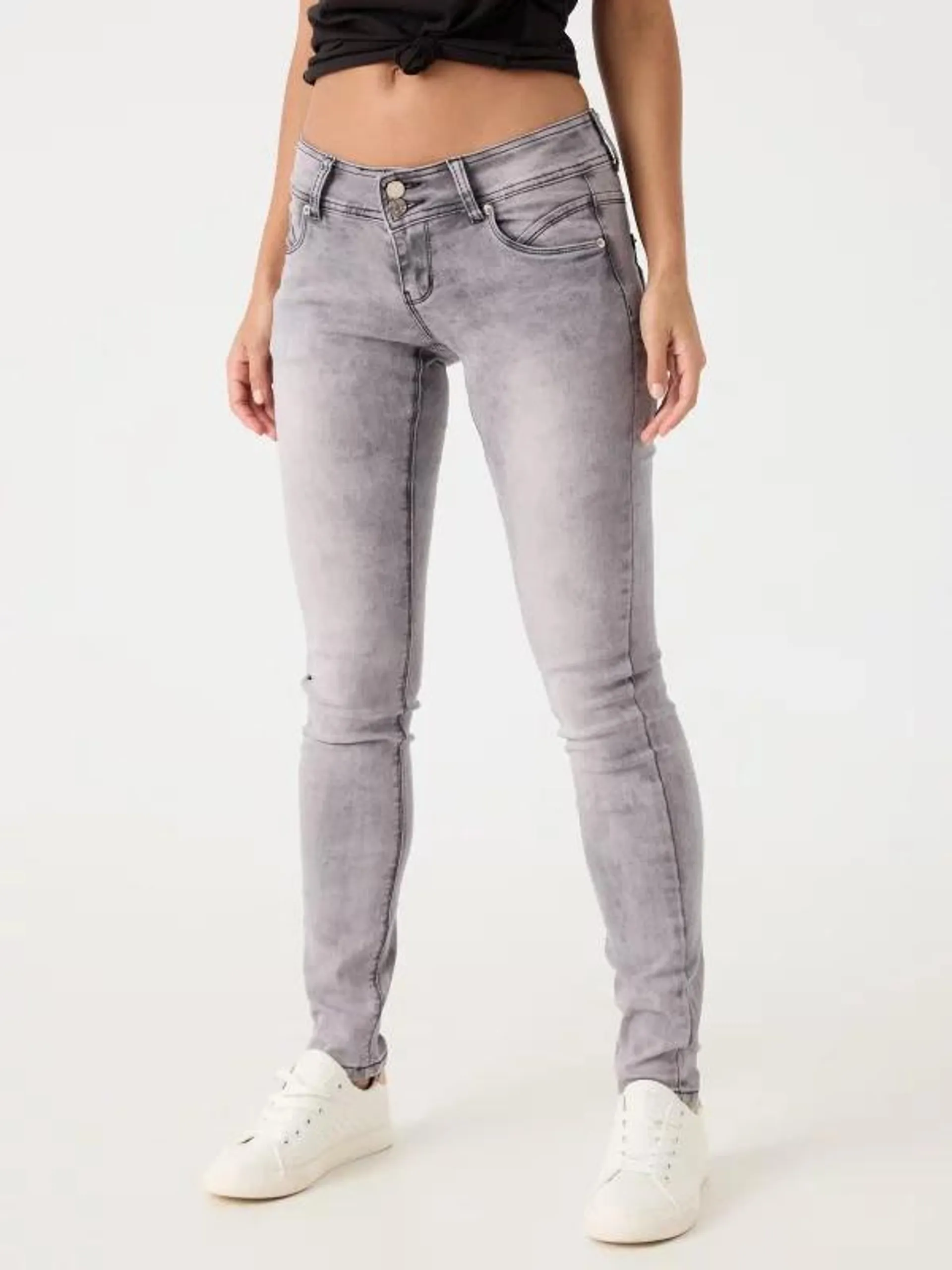 Jeans skinny efecto lavado tiro bajo